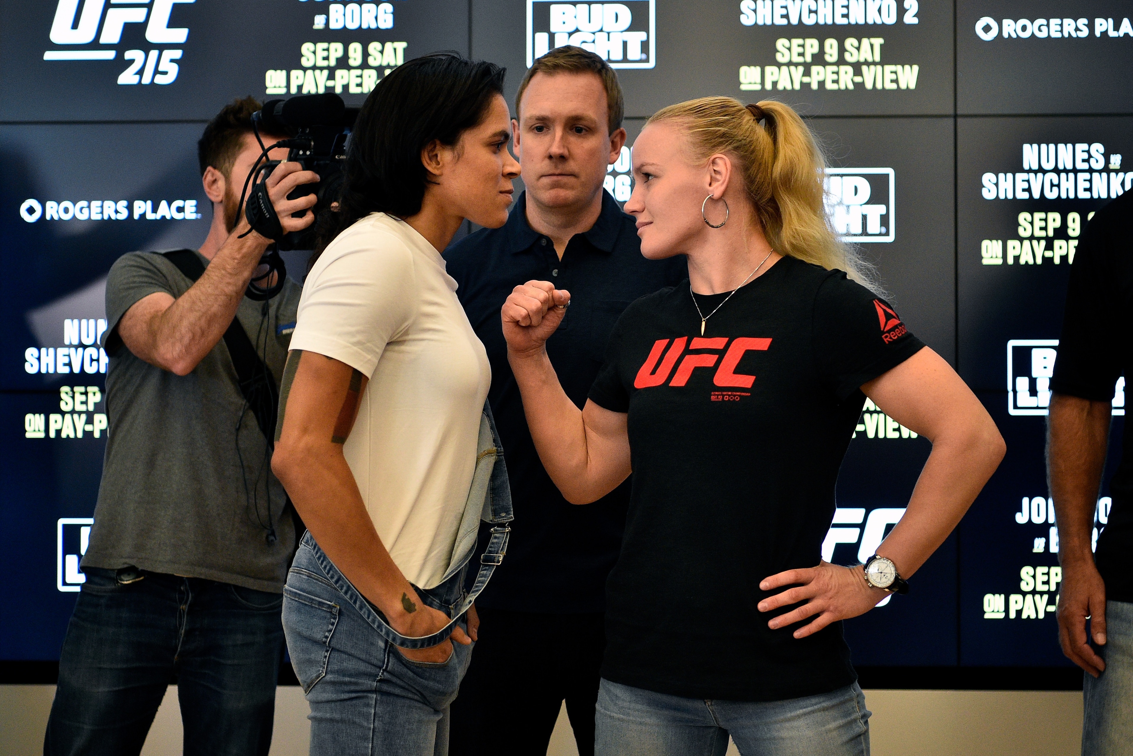 EDMONTON, AB - SEPTEMBER 06:  (L-R) UFC women's bantamweight champion Amanda Nunes of Brazil and Valentina Shevchenko of Kyrgyzstan face off for the media during the UFC 215 Ultimate Media Day at Rogers Place on September 6, 2017 in Edmonton, Alberta, Can