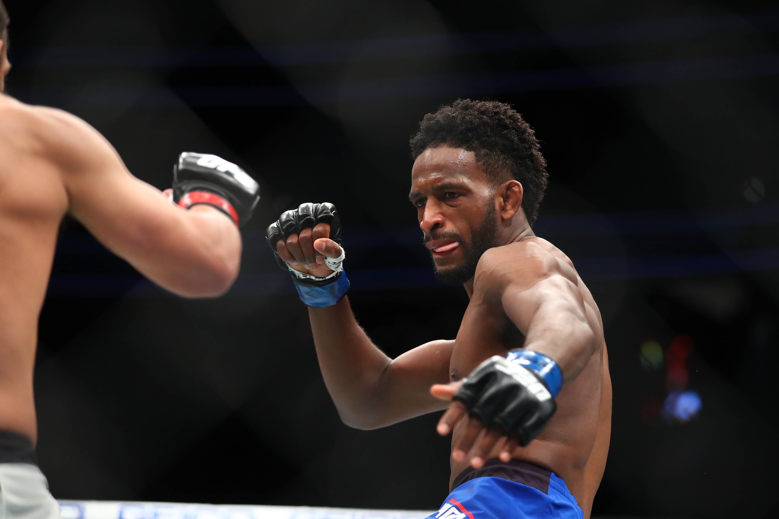 December 30, 2016; Las Vegas, NV, USA; Neil Magny moves in against Johny Hendricks during UFC 207 at T-Mobile Arena. Mandatory Credit: Mark J. Rebilas-USA TODAY Sports