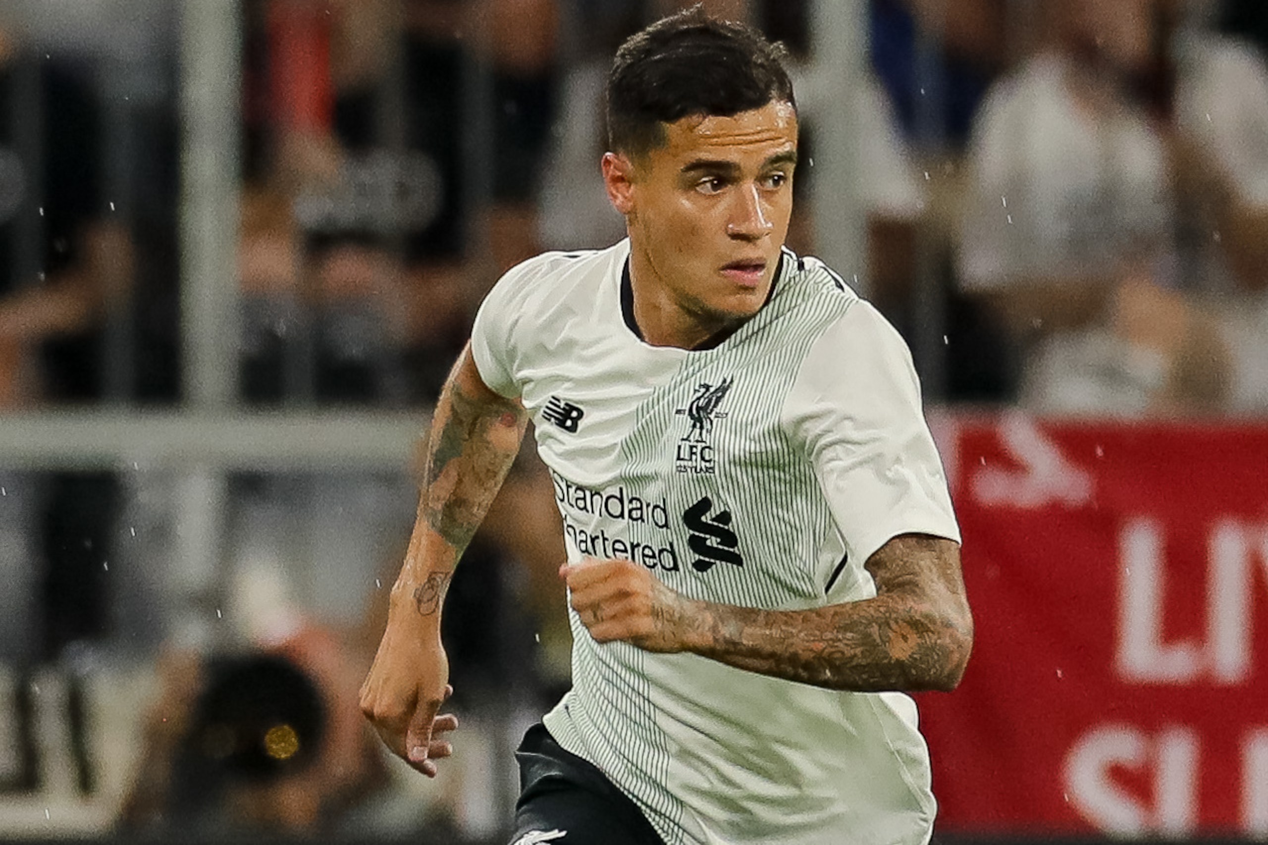 MUNICH, GERMANY - AUGUST 01: Philippe Coutinho of Liverpool controls the ball during the Audi Cup 2017 match between Bayern Muenchen and Liverpool FC at Allianz Arena on August 1, 2017 in Munich, Germany. (Photo by TF-Images/TF-Images via Getty Images)