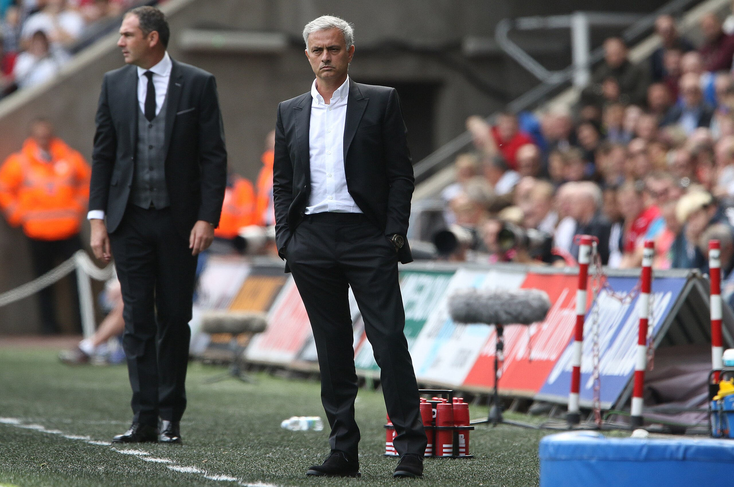 SWANSEA, WALES - AUGUST 19: Swansea City manager Paul Clement and Manchester United manager Jose Mourinho during the Premier League match between Swansea City and Manchester United at The Liberty Stadium on August 19, 2017 in Swansea, Wales. (Photo by Ath