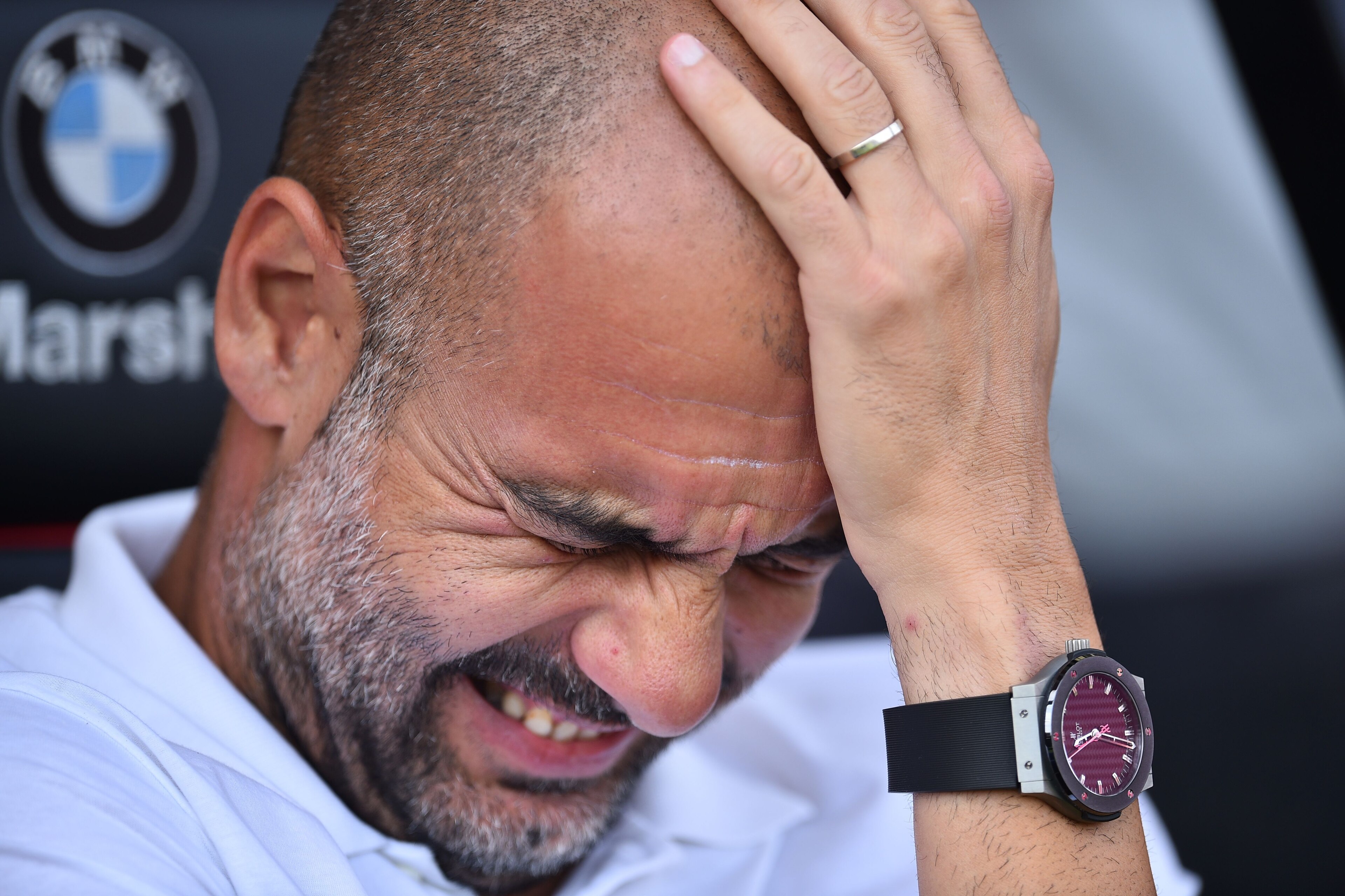 Manchester City's Spanish manager Pep Guardiola gestures as he awaits kick off ahead of the English Premier League football match between Bournemouth and Manchester City at the Vitality Stadium in Bournemouth, southern England on August 26, 2017. / AFP PH