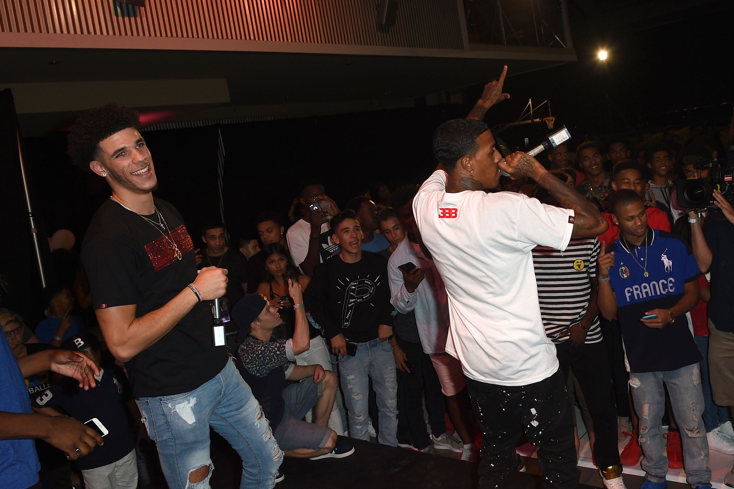CHINO, CA - SEPTEMBER 02:  Lonzo Ball (L) and Kenneth Paige perform onstage at Melo Ball's 16th Birthday on September 2, 2017 in Chino, California.  (Photo by Joshua Blanchard/Getty Images for Crosswalk Productions )