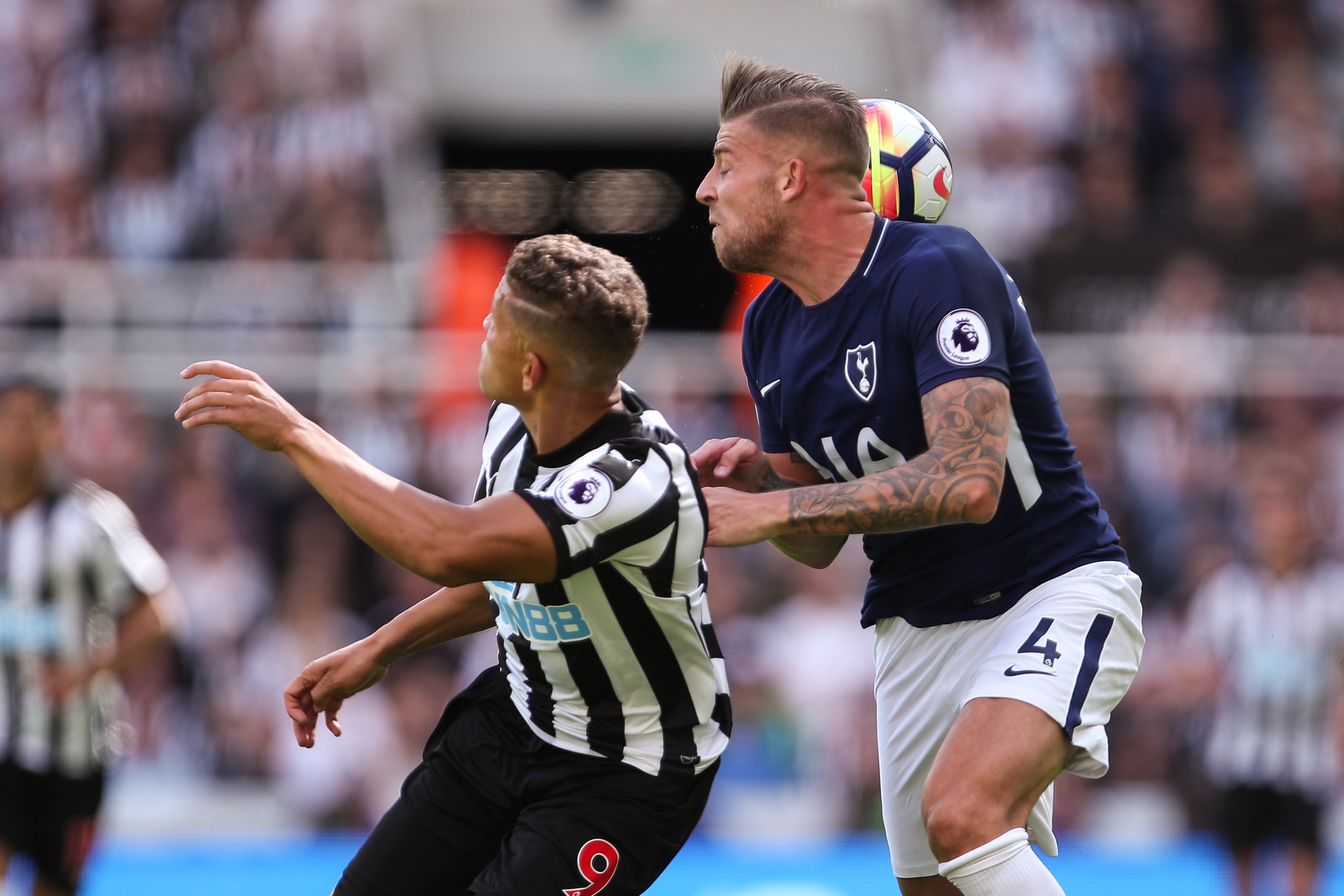 NEWCASTLE UPON TYNE, ENGLAND - AUGUST 13: /Dwight Gayle of Newcastle United and Toby Alderweireld of Tottenham Hotspur during the Premier League match between Newcastle United and Tottenham Hotspur at St. James Park on August 13, 2017 in Newcastle upon Ty