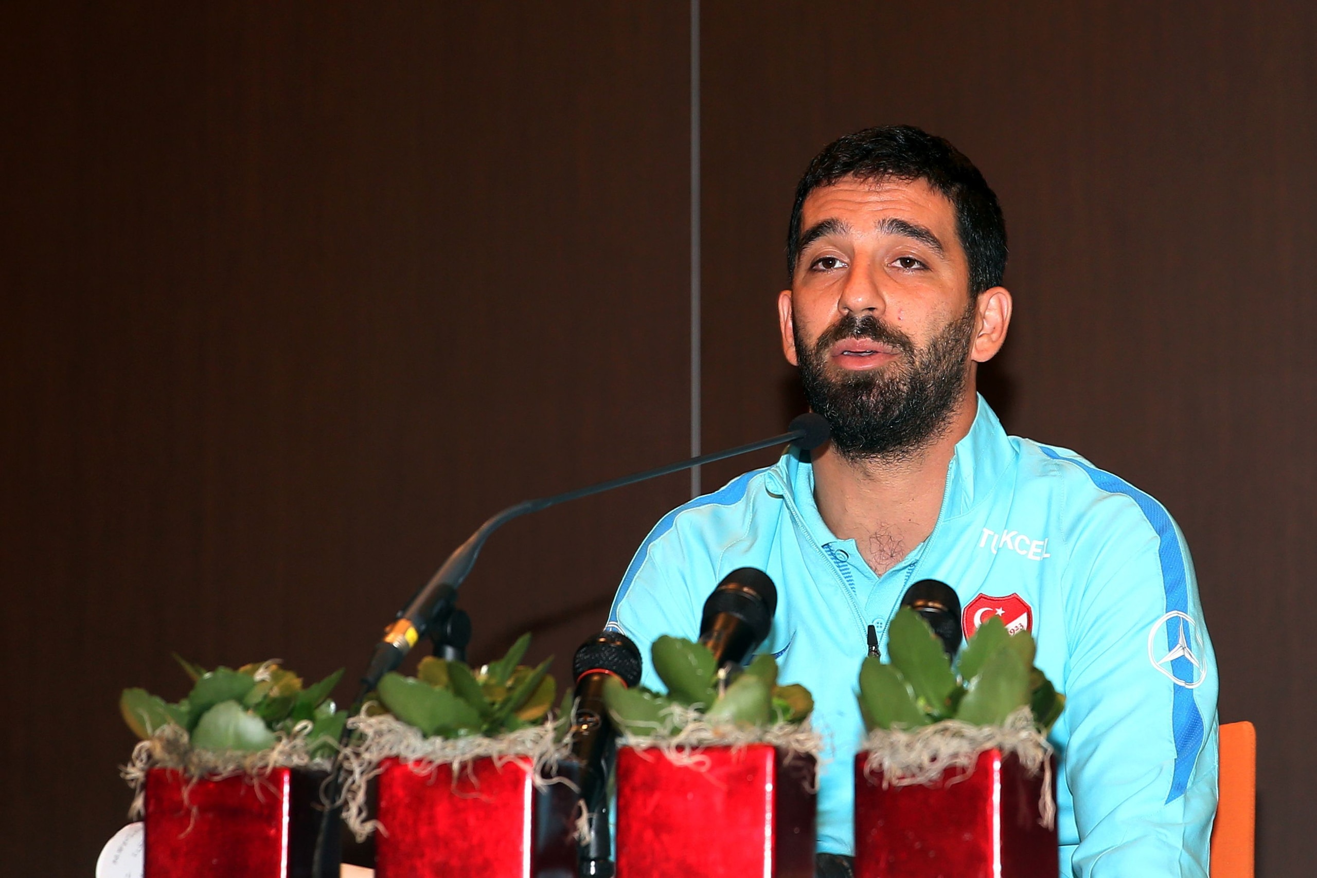 Barcelona's Turkish midfielder and Turkey's captain Arda Turan addresses a press conference announcing his retirement from international football in Portoroz, Slovenia, on June 6, 2017.
Turan announced his retirement from international football on Tuesday