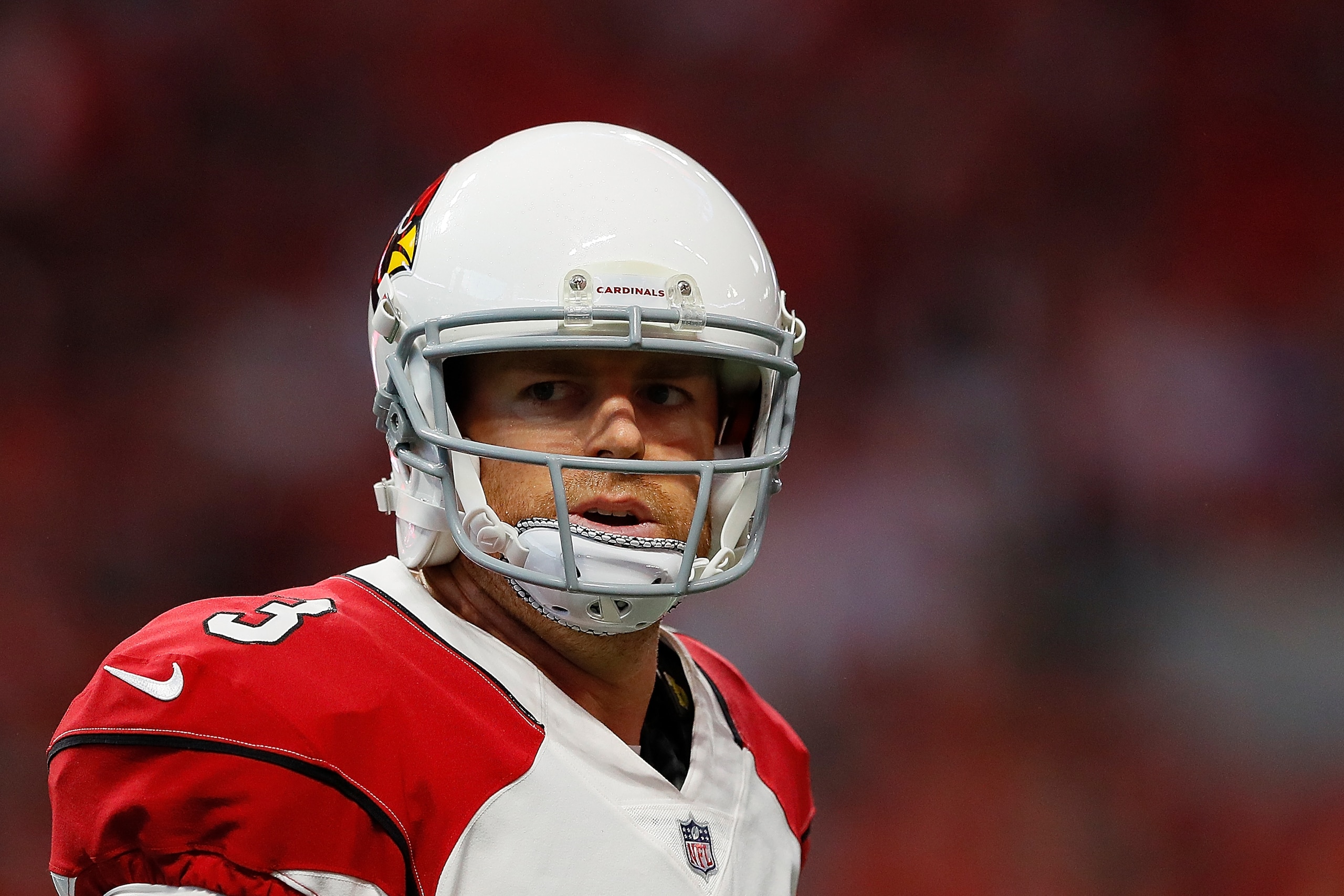 ATLANTA, GA - AUGUST 26:  Carson Palmer #3 of the Arizona Cardinals runs off the field against the Atlanta Falcons at Mercedes-Benz Stadium on August 26, 2017 in Atlanta, Georgia.  (Photo by Kevin C. Cox/Getty Images)
