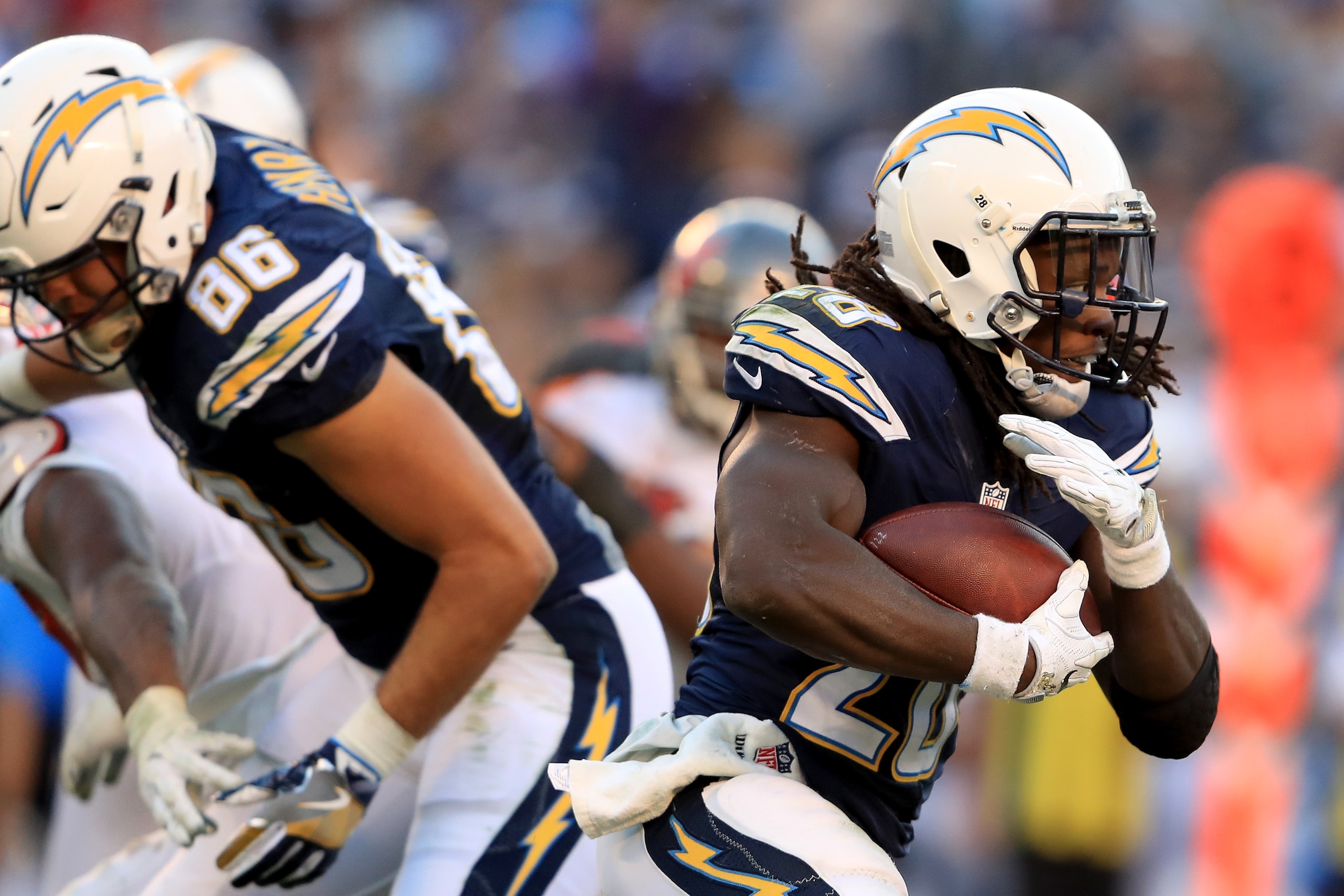 SAN DIEGO, CA - DECEMBER 04:   Melvin Gordon #28 of the San Diego Chargers runs the ball during the second half of a game against the Tampa Bay Buccaneers  at Qualcomm Stadium on December 4, 2016 in San Diego, California.  (Photo by Sean M. Haffey/Getty I