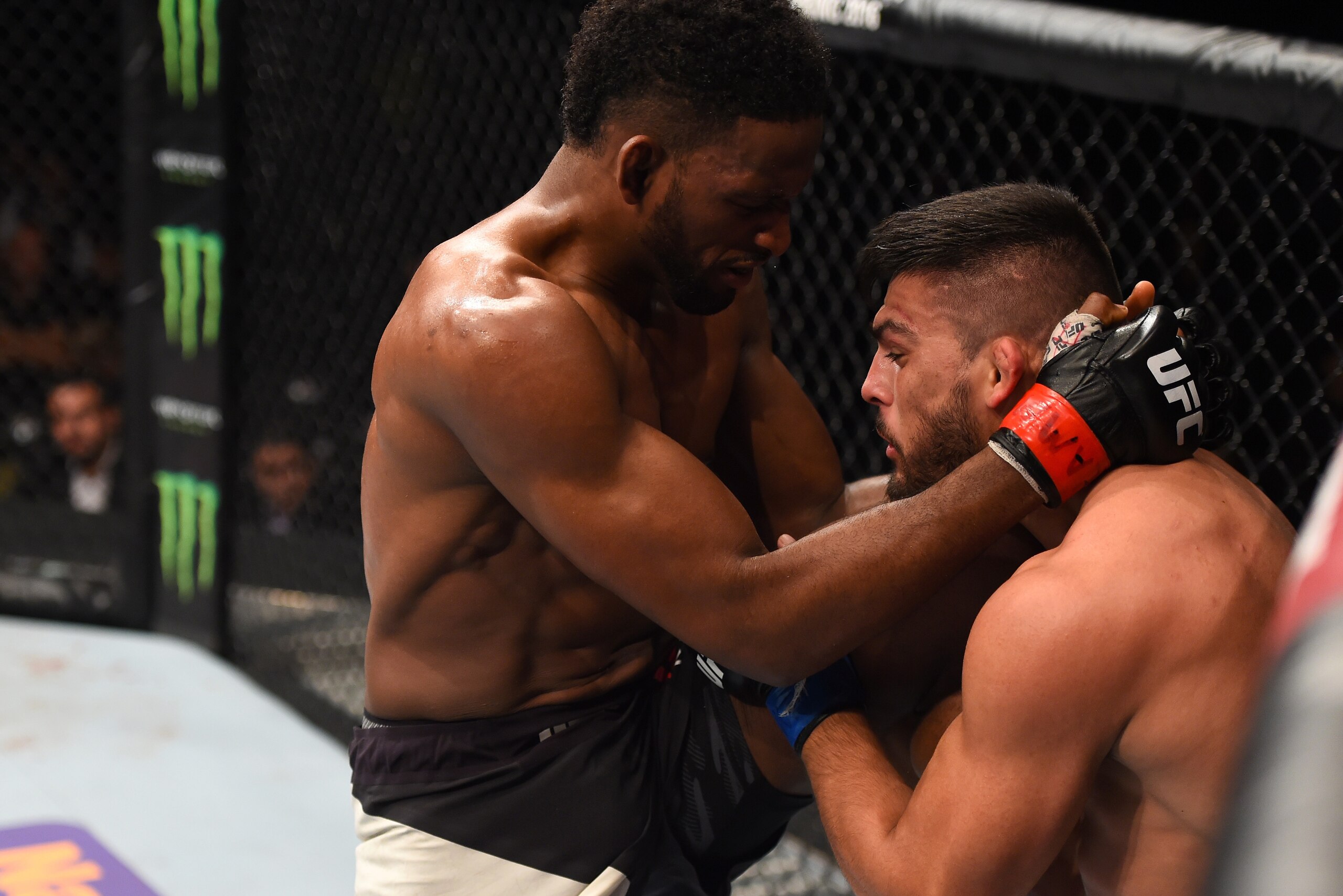 MONTERREY, MEXICO - NOVEMBER 21: (L-R) Neil Magny of the United States knees Kelvin Gastelum of the United States in their welterweight bout during the UFC Fight Night event at Arena Monterrey on November 21, 2015 in Monterrey, Mexico. (Photo by Jeff Bo MONTERREY, MEXICO - NOVEMBER 21: (L-R) Neil Magny of the United States knees Kelvin Gastelum of the United States in their welterweight bout during the UFC Fight Night event at Arena Monterrey on November 21, 2015 in Monterrey, Mexico. (Photo by Jeff Bo