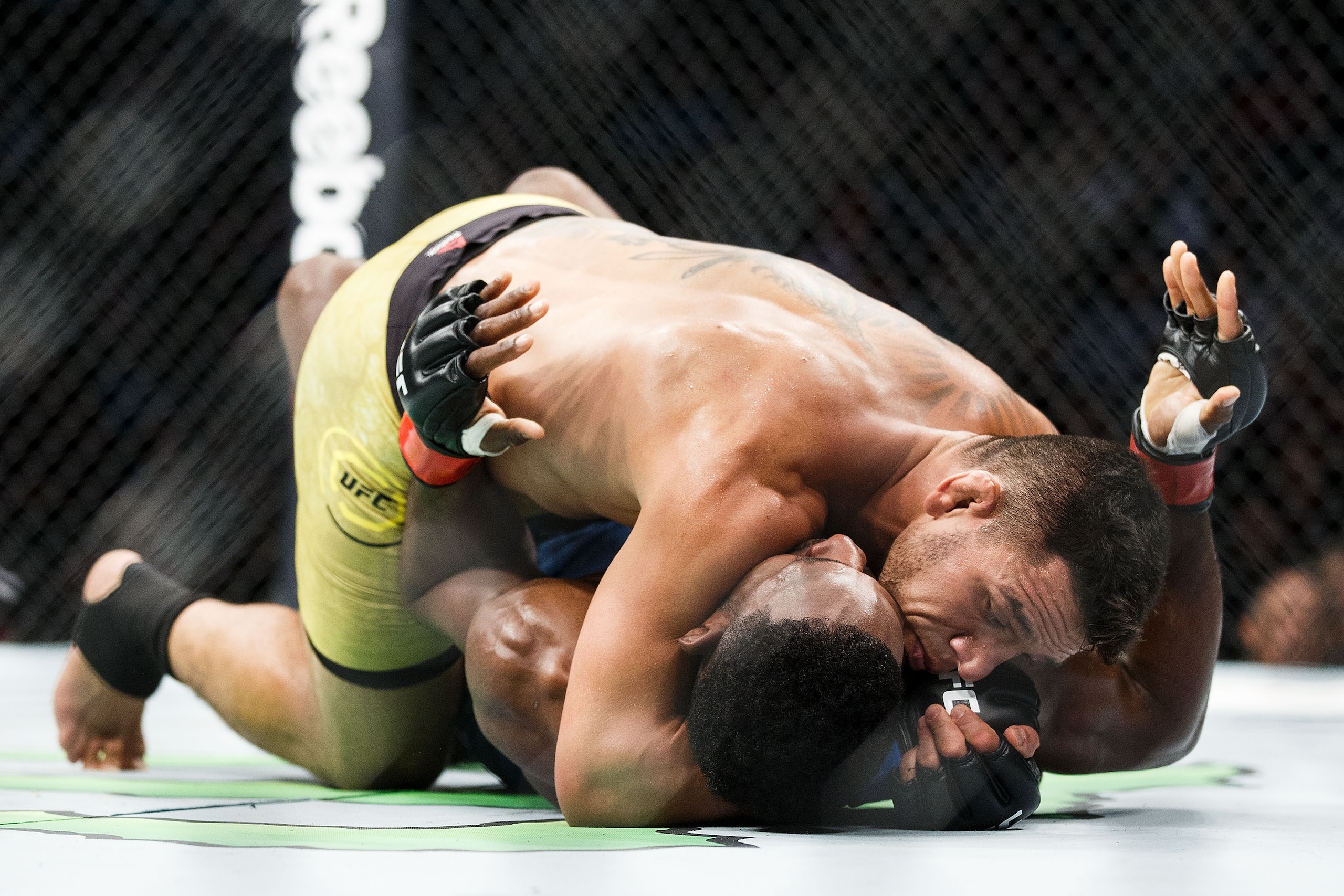 EDMONTON, AB - SEPTEMBER 09: Neil Magny, bottom, fights Rafael Dos Anjos during UFC 215 at Rogers Place on September 9, 2017 in Edmonton, Canada. (Photo by Codie McLachlan/Getty Images)