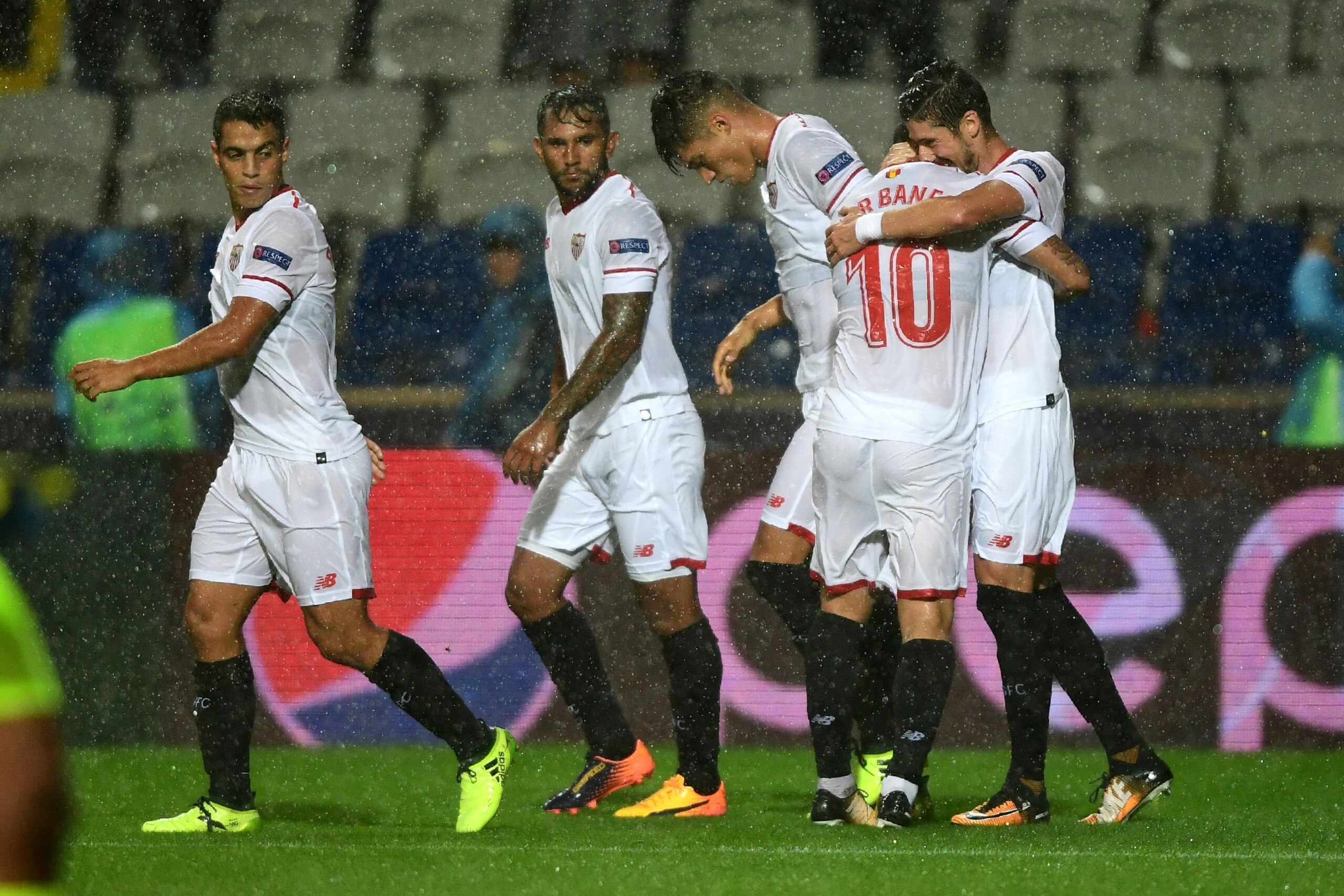 Sevilla's defender Sergio Escudero (R) celebrates with his teammates after scoring a goal during the UEFA Champions League play-off first leg football match between Istanbul Basaksehir and Sevilla FC at the Fatih Terim Stadium in Istanbul on August 16, 20 Sevilla's defender Sergio Escudero (R) celebrates with his teammates after scoring a goal during the UEFA Champions League play-off first leg football match between Istanbul Basaksehir and Sevilla FC at the Fatih Terim Stadium in Istanbul on August 16, 20