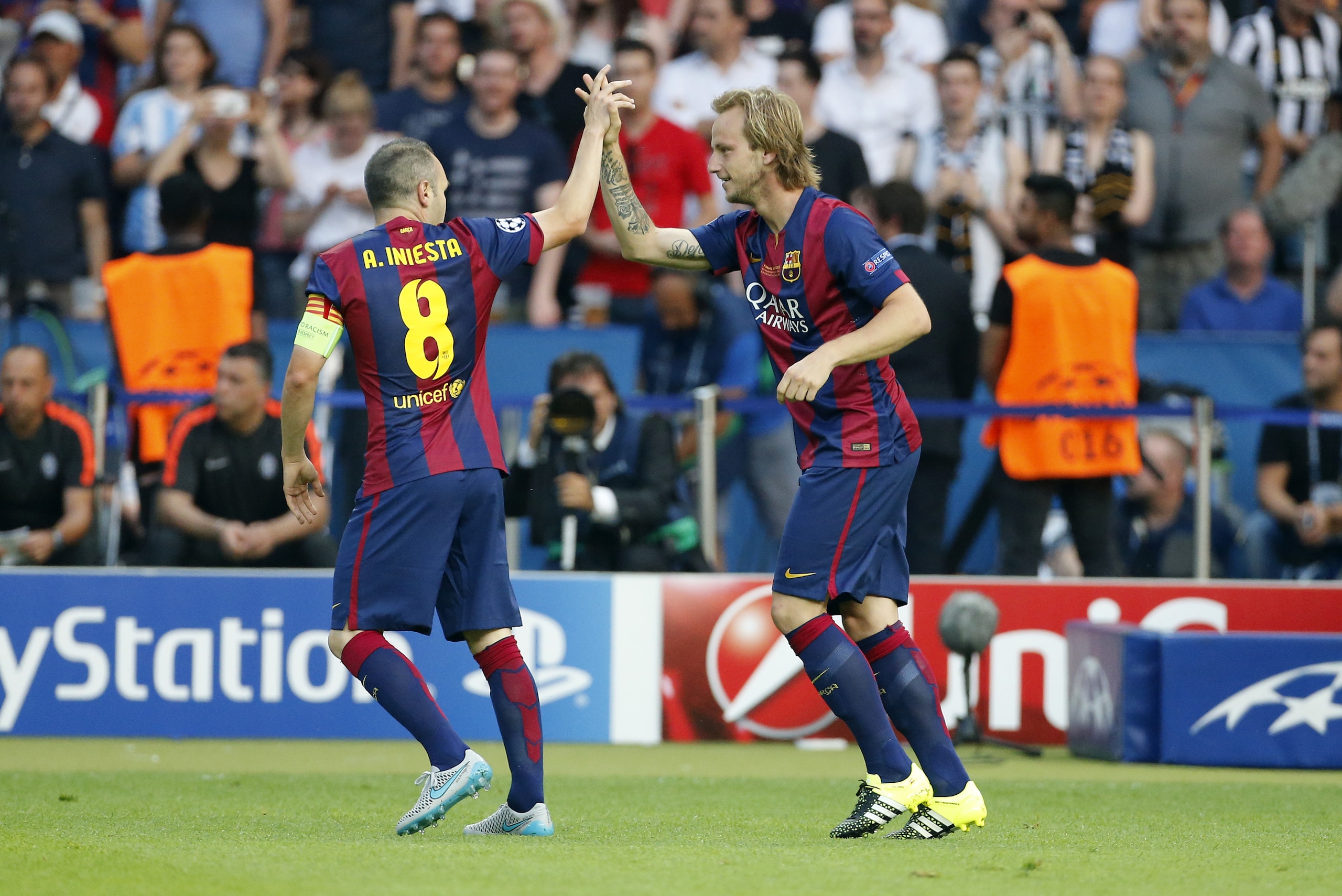 BERLIN, GERMANY - JUNE 6: Ivan Rakitic of Barcelona celebrates his goal with Andres Iniesta of Barcelona during the UEFA Champions League Final between Juventus Turin and FC Barcelona at Olympiastadion on June 6, 2015 in Berlin, Germany. (Photo by Jean Ca