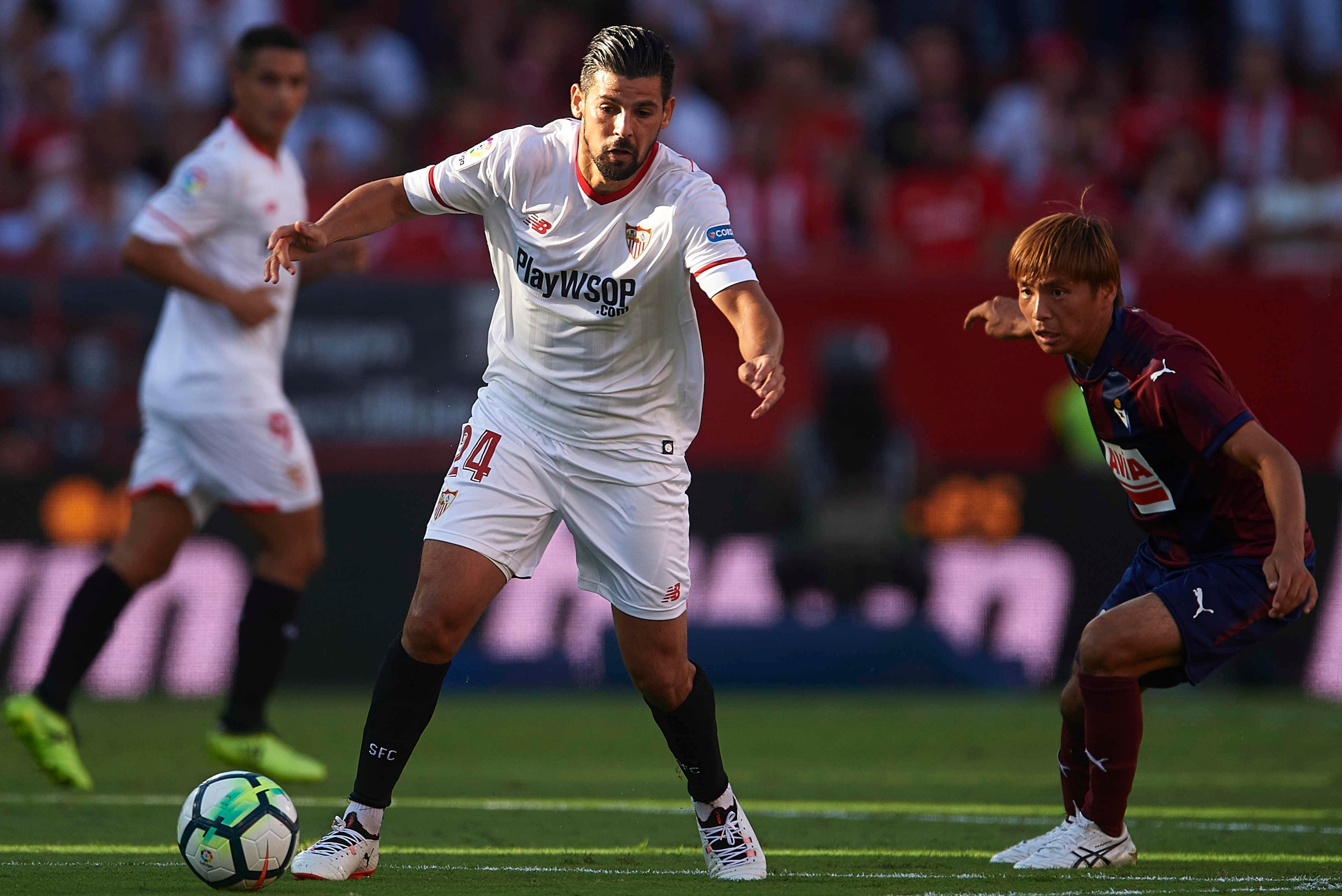 SEVILLE, SPAIN - SEPTEMBER 09: Manuel Agudo 'Nolito'of Sevilla FC (L) being followed by Akashi Inui of SD Eibar (R)during the La Liga match between Sevilla and Eibar at Estadio Ramon Sanchez Pizjuan on September 9, 2017 in Seville, Spain . (Photo by Ait SEVILLE, SPAIN - SEPTEMBER 09: Manuel Agudo 'Nolito'of Sevilla FC (L) being followed by Akashi Inui of SD Eibar (R)during the La Liga match between Sevilla and Eibar at Estadio Ramon Sanchez Pizjuan on September 9, 2017 in Seville, Spain . (Photo by Ait