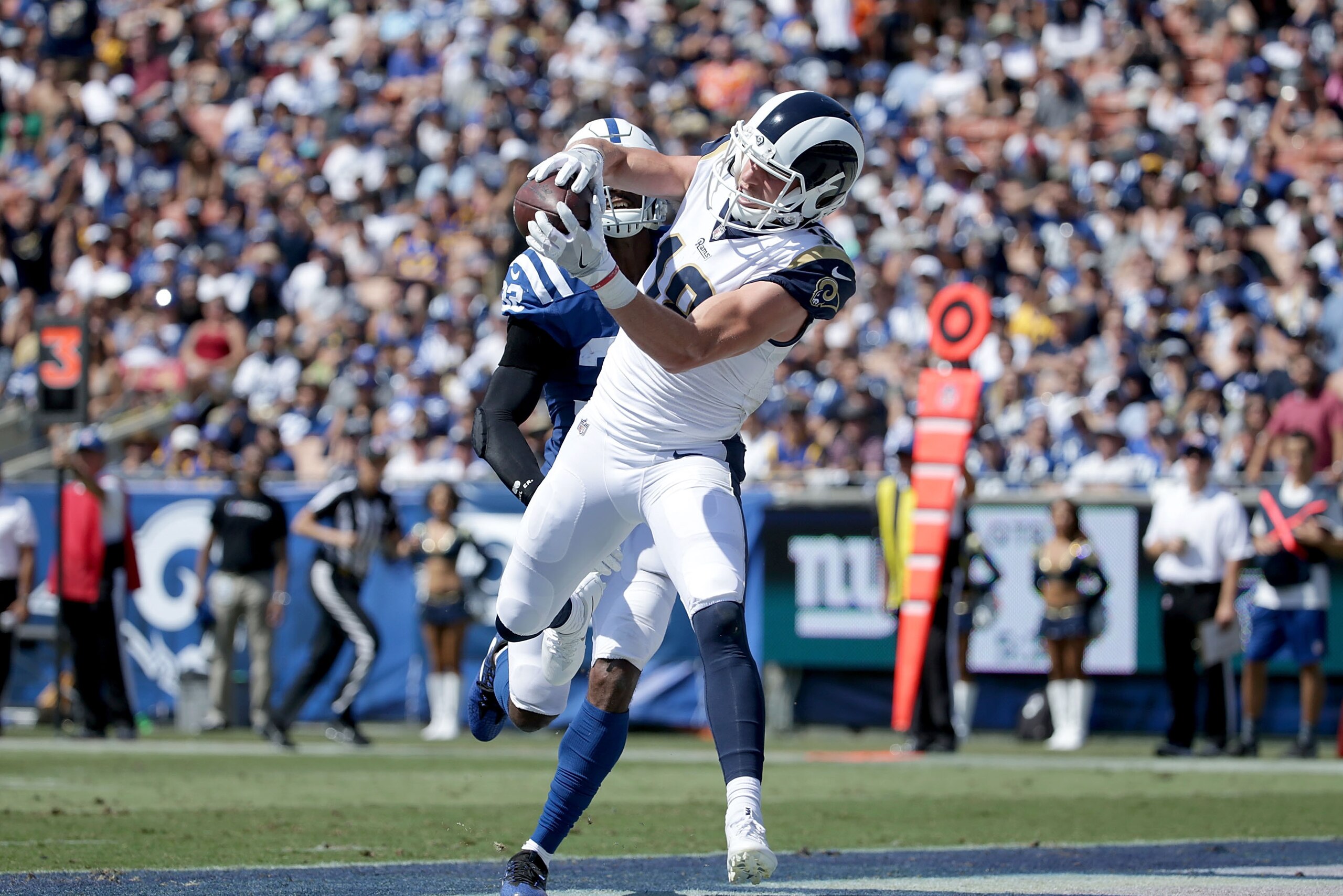 LOS ANGELES, CA - SEPTEMBER 10:  Wide receiver Cooper Kupp #18 of the Los Angeles Rams catches a pass for a touchdown in front of free safety T.J. Green #32 of the Indianapolis Colts in the second quarter at Los Angeles Memorial Coliseum on September 10, 