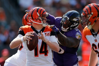 CINCINNATI, OH - SEPTEMBER 10:  Terrell Suggs #55 of the Baltimore Ravens sacks Andy Dalton #14 of the Cincinnati Bengals during the fourth quarter at Paul Brown Stadium on September 10, 2017 in Cincinnati, Ohio. (Photo by Michael Reaves/Getty Images)