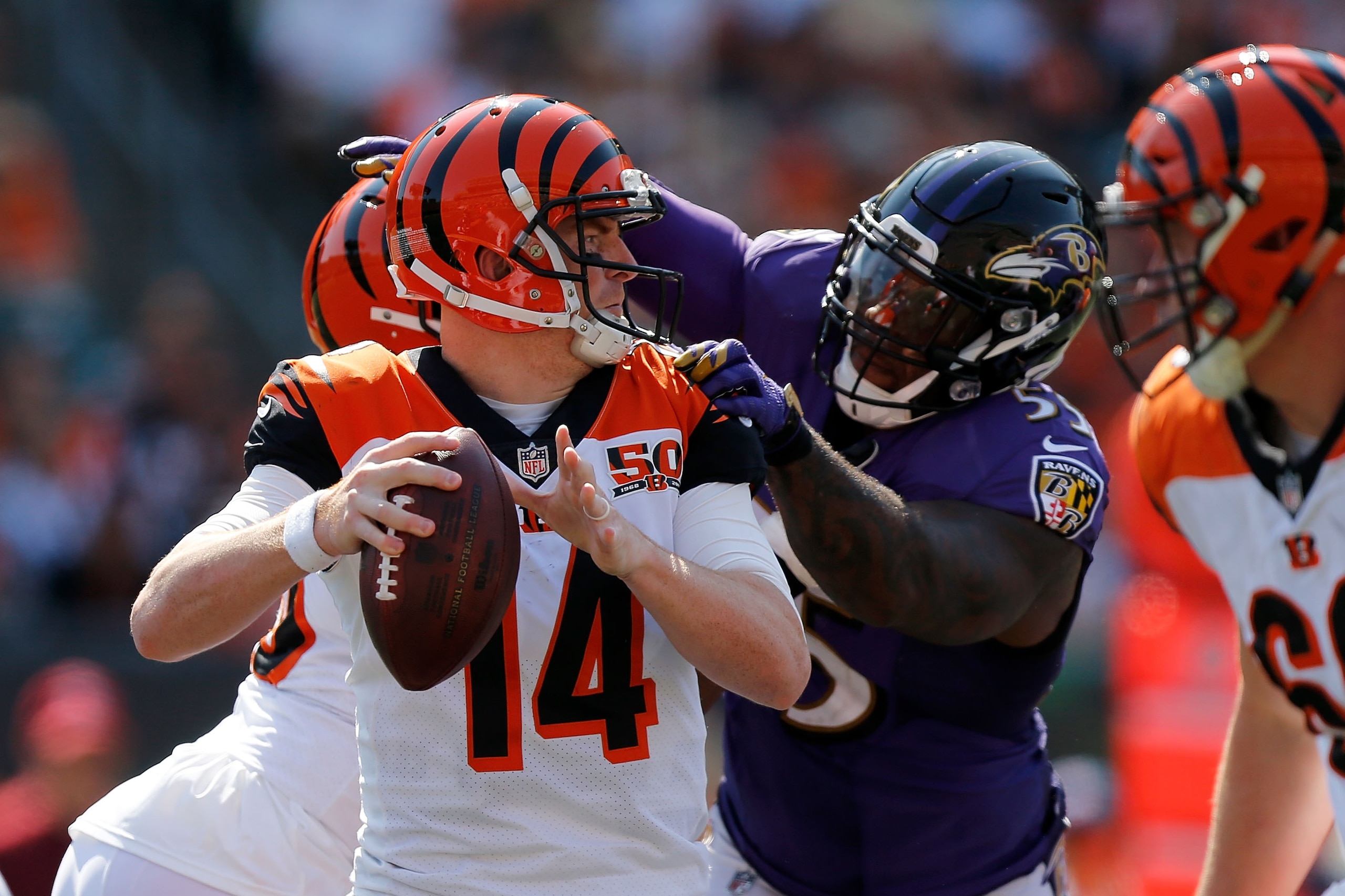 CINCINNATI, OH - SEPTEMBER 10:  Terrell Suggs #55 of the Baltimore Ravens sacks Andy Dalton #14 of the Cincinnati Bengals during the fourth quarter at Paul Brown Stadium on September 10, 2017 in Cincinnati, Ohio. (Photo by Michael Reaves/Getty Images)