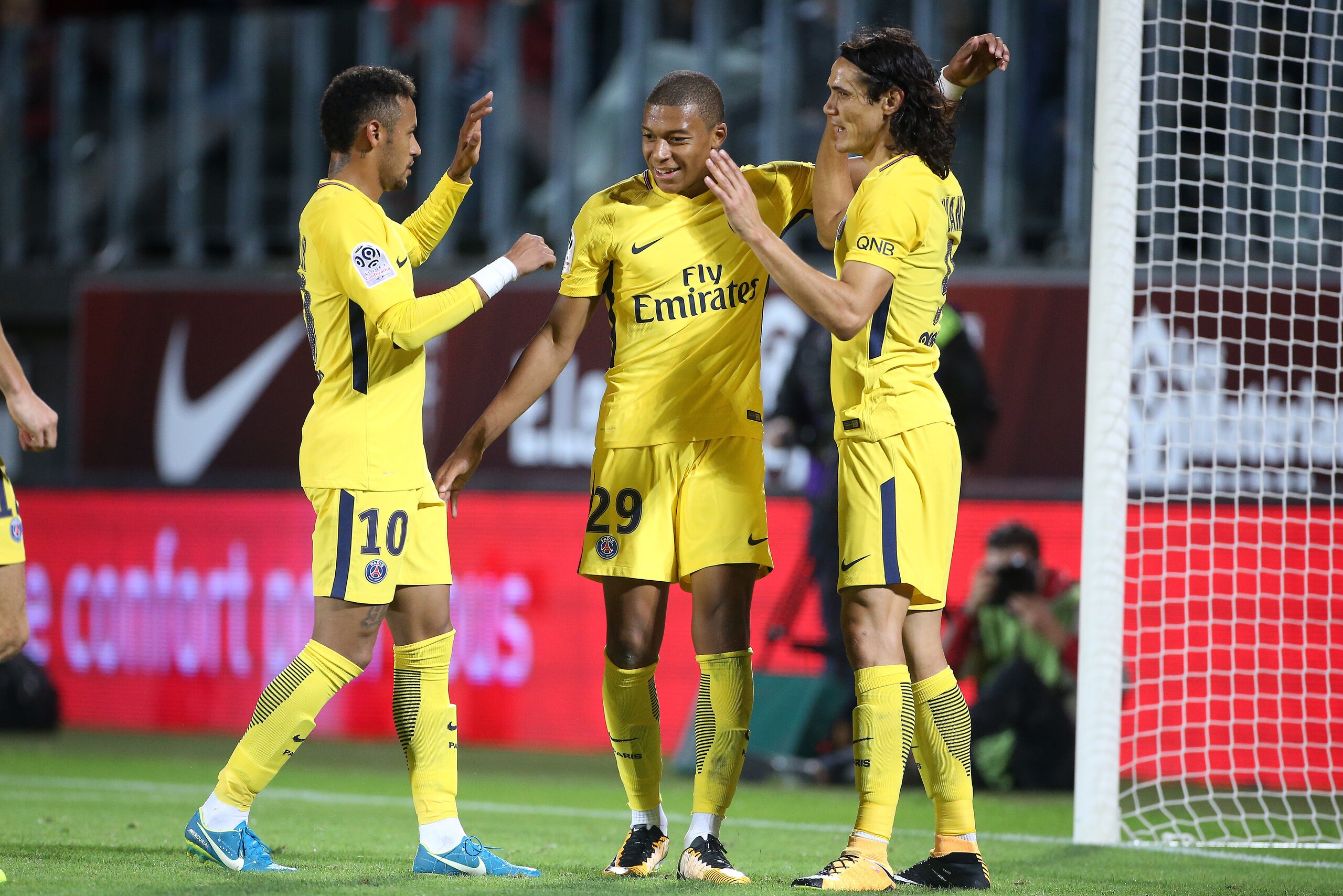 METZ, FRANCE - SEPTEMBER 8: Edinson Cavani of PSG (right) celebrates his second goal with Neymar Jr, Kylian Mbappe during the French Ligue 1 match between FC Metz and Paris Saint Germain (PSG) at Stade Saint-Symphorien on September 9, 2017 in Metz, France