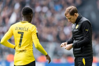 DORTMUND, GERMANY - APRIL 15: Ousmane Dembele of Dortmund speak with Head coach Thomas Tuchel of Dortmund during the Bundesliga match between Borussia Dortmund and Eintracht Frankfurt at Signal Iduna Park on April 15, 2017 in Dortmund, Germany. (Photo by 