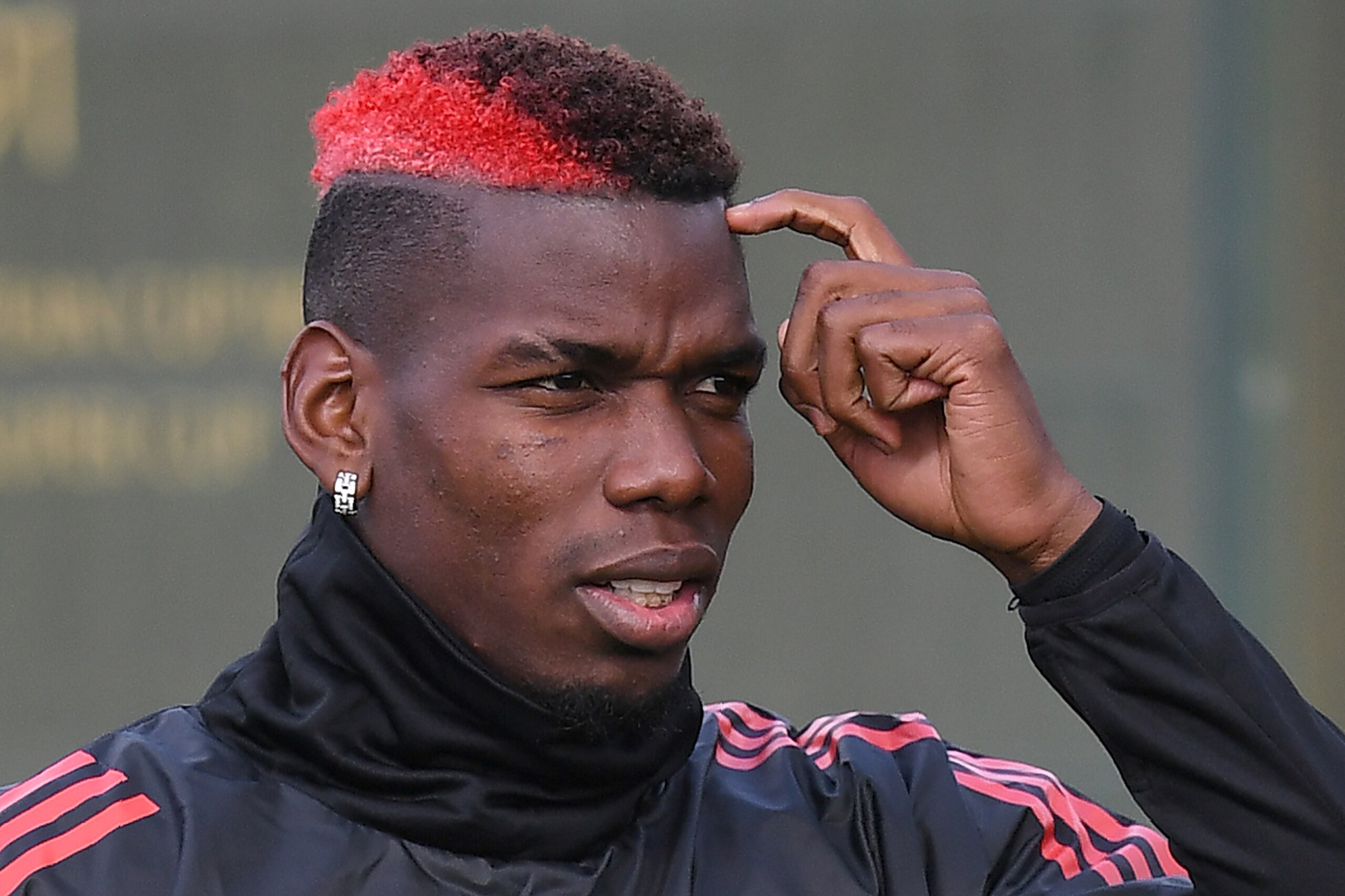 Manchester United's French midfielder Paul Pogba attends a team training session at the club's training complex near Carrington, west of Manchester in north west England on September 11, 2017, on the eve of their UEFA Champions League Group A football mat Manchester United's French midfielder Paul Pogba attends a team training session at the club's training complex near Carrington, west of Manchester in north west England on September 11, 2017, on the eve of their UEFA Champions League Group A football mat