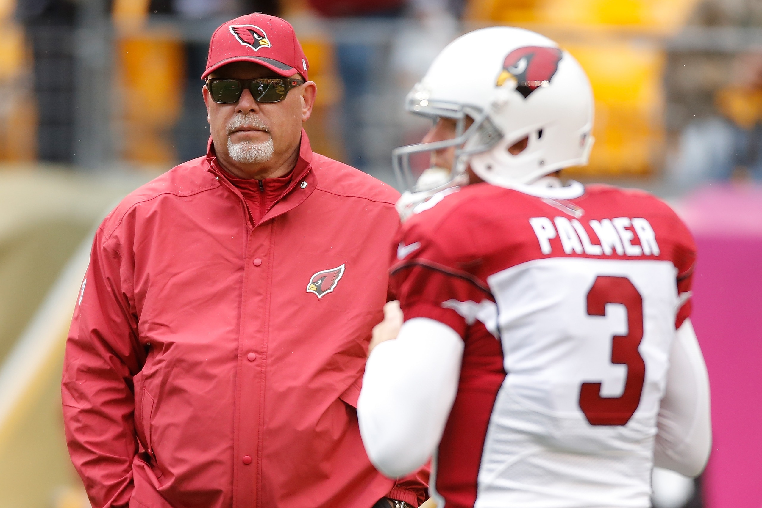 PITTSBURGH, PA - OCTOBER 18: Head Coach Bruce Arians of the of the Arizona Cardinals and Carson Palmer #3 look on before the game against the Pittsburgh Steelers at Heinz Field on October 18, 2015 in Pittsburgh, Pennsylvania. (Photo by Gregory Shamus/Ge PITTSBURGH, PA - OCTOBER 18: Head Coach Bruce Arians of the of the Arizona Cardinals and Carson Palmer #3 look on before the game against the Pittsburgh Steelers at Heinz Field on October 18, 2015 in Pittsburgh, Pennsylvania. (Photo by Gregory Shamus/Ge