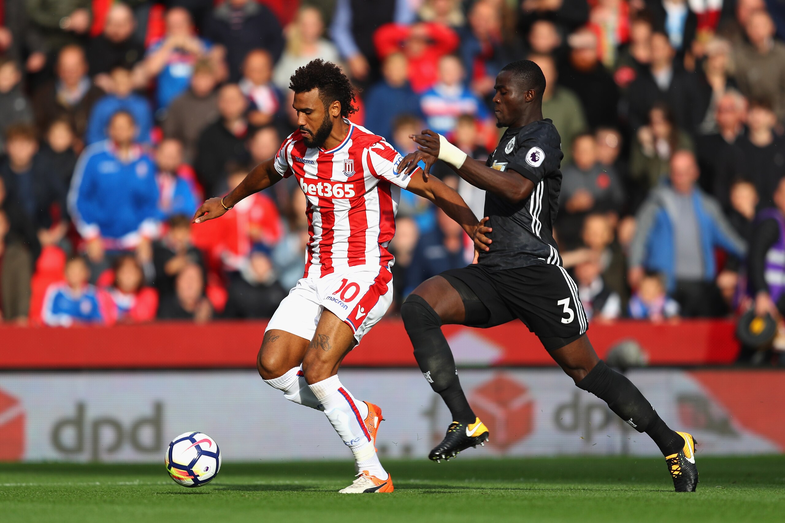 STOKE ON TRENT, ENGLAND - SEPTEMBER 09:  Eric Bailly of Manchester United chases down Maxim Choupo-Moting of Stoke City during the Premier League match between Stoke City and Manchester United at Bet365 Stadium on September 9, 2017 in Stoke on Trent, Engl