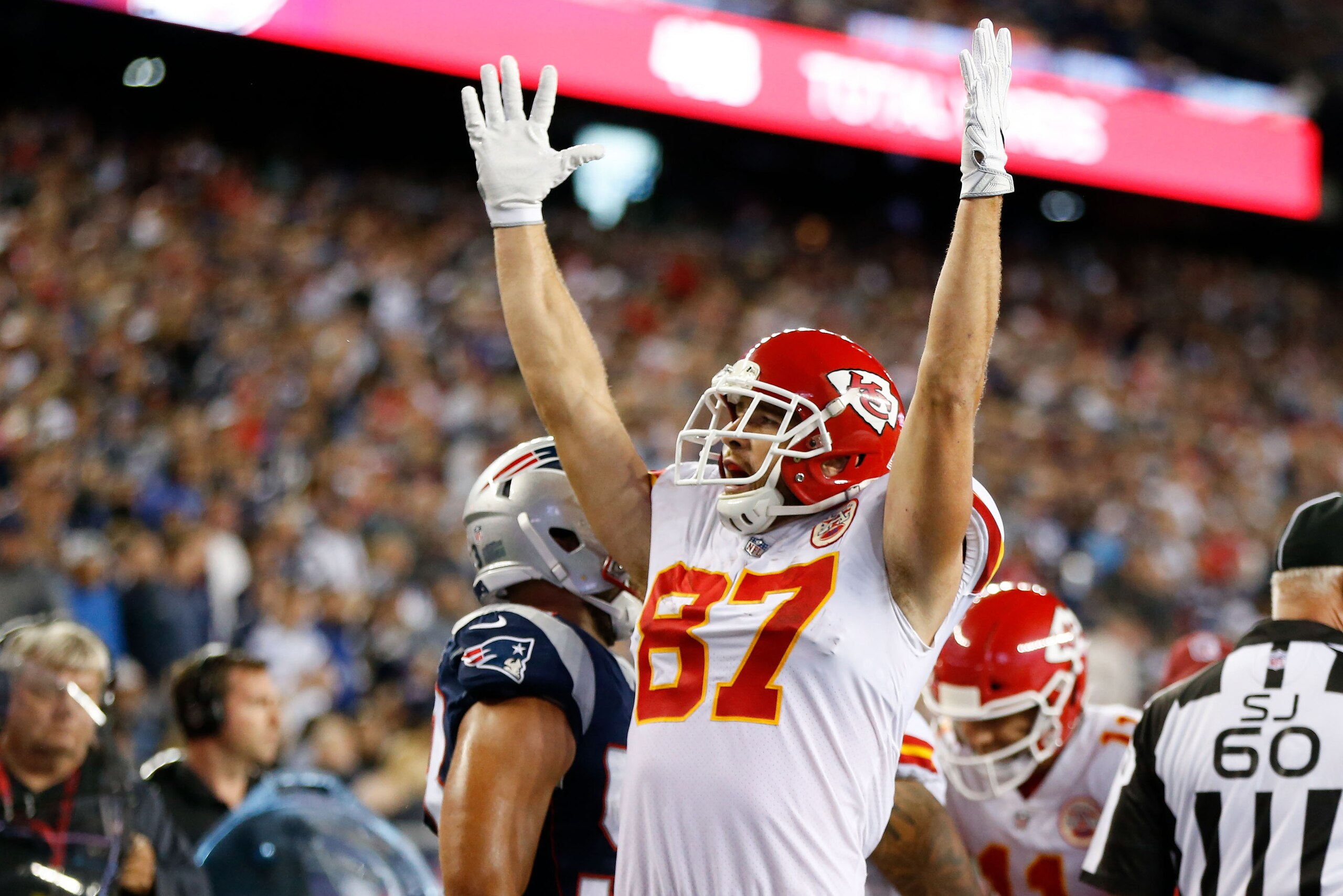 Sep 7, 2017; Foxborough, MA, USA;  Kansas City Chiefs tight end Travis Kelce (87) celebrates a fourth quarter touchdown by running back Kareem Hunt (27) (not pictured) at Gillette Stadium. Mandatory Credit: Greg M. Cooper-USA TODAY Sports