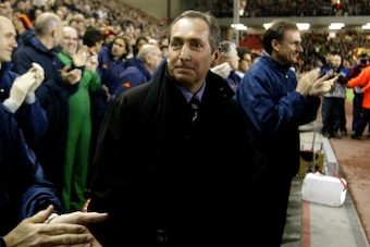19 Mar 2002:  Manager Gerard Houllier of Liverpool makes his return to Anfield during the Liverpool v AS Roma UEFA Champions League, Group B match at Anfield, Liverpool. DIGITAL IMAGE. Mandatory Credit: Gary M. Prior/Getty Images