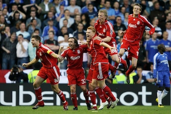 LIVERPOOL, UNITED KINGDOM - MAY 01:  Daniel Agger of Liverpool is mobbed by team mates after scoring the first goal of the game during the UEFA Champions League semi final second leg match between Liverpool and Chelsea at Anfield on May 1, 2007 in Liverpo