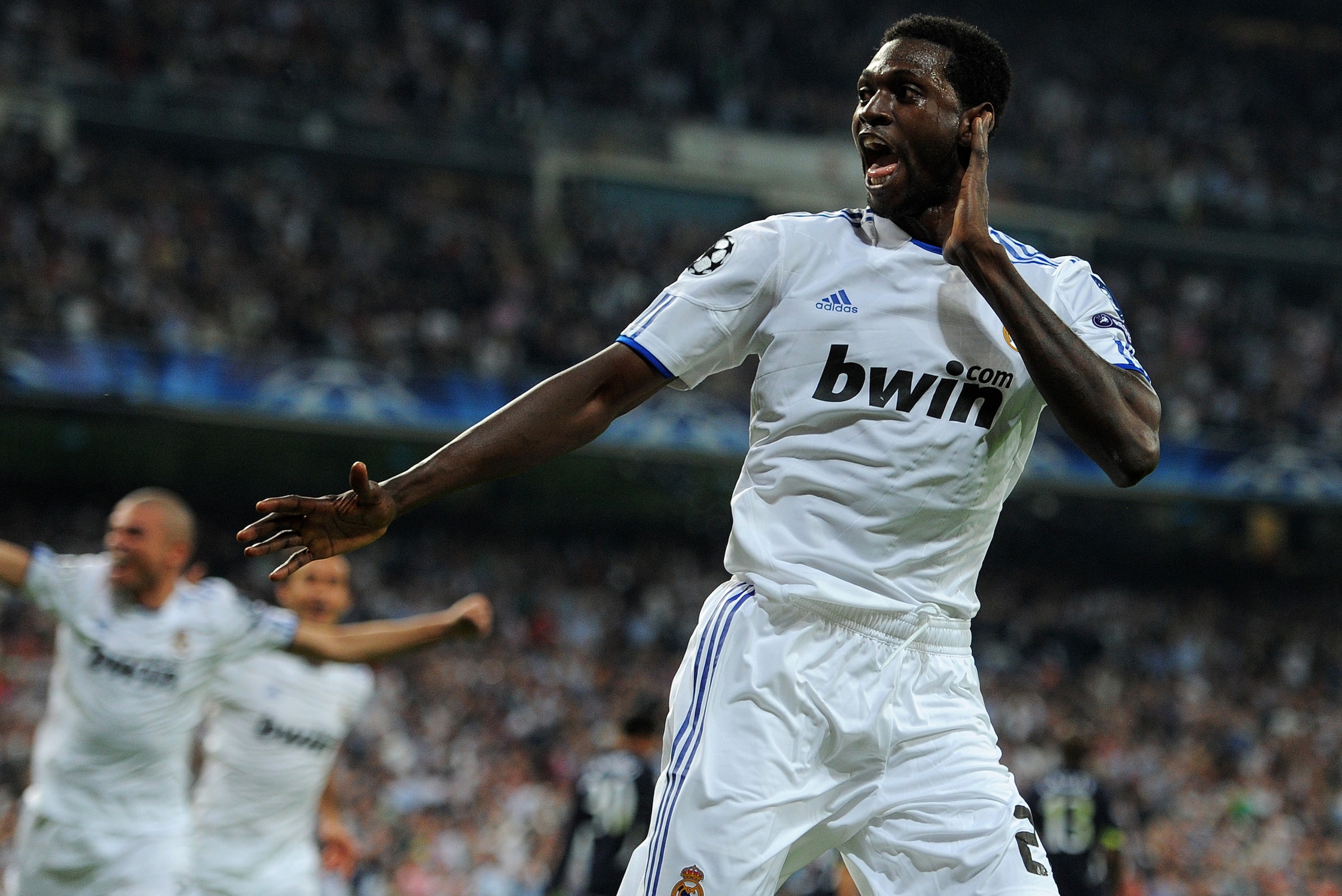 MADRID, SPAIN - APRIL 05: Emmanuel Adebayor of Real Madrid celebrates scoring his second goal during the UEFA Champions League quarter final first leg match between Real Madrid and Tottenham Hotspur at Estadio Santiago Bernabeu on April 5, 2011 in Madrid MADRID, SPAIN - APRIL 05: Emmanuel Adebayor of Real Madrid celebrates scoring his second goal during the UEFA Champions League quarter final first leg match between Real Madrid and Tottenham Hotspur at Estadio Santiago Bernabeu on April 5, 2011 in Madrid