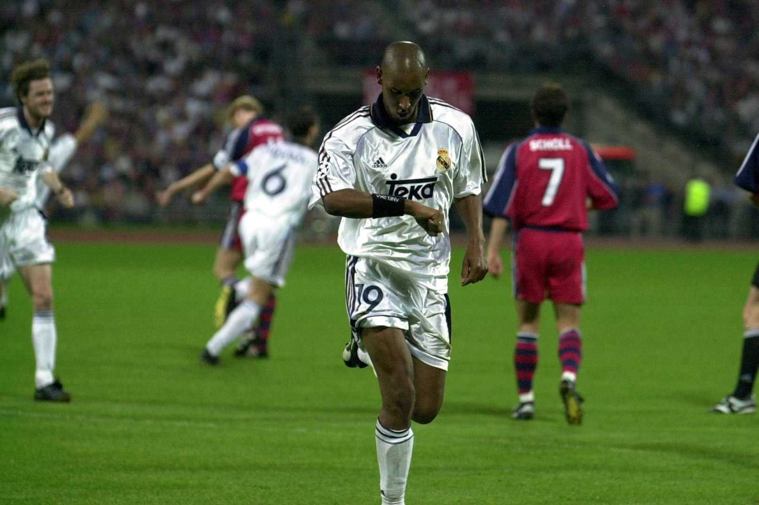9 May 2000: Nicolas Anelka of Real Madrid celebrates after scoring the vital away goal during the Bayern Munich v Real Madrid Champions League Semi-Final second legat the Olympic Stadium, Munich, Germany. Mandatory Credit: Ross Kinnaird/ALLSPORT 9 May 2000: Nicolas Anelka of Real Madrid celebrates after scoring the vital away goal during the Bayern Munich v Real Madrid Champions League Semi-Final second legat the Olympic Stadium, Munich, Germany. Mandatory Credit: Ross Kinnaird/ALLSPORT