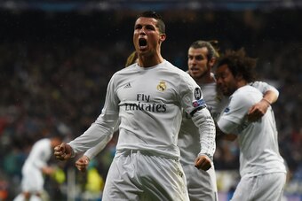 MADRID, SPAIN - APRIL 12:  Cristiano Ronaldo of Real Madrid celebrates his second goal during the UEFA Champions League quarter final second leg match between Real Madrid CF and VfL Wolfsburg at Estadio Santiago Bernabeu on April 12, 2016 in Madrid, Spain