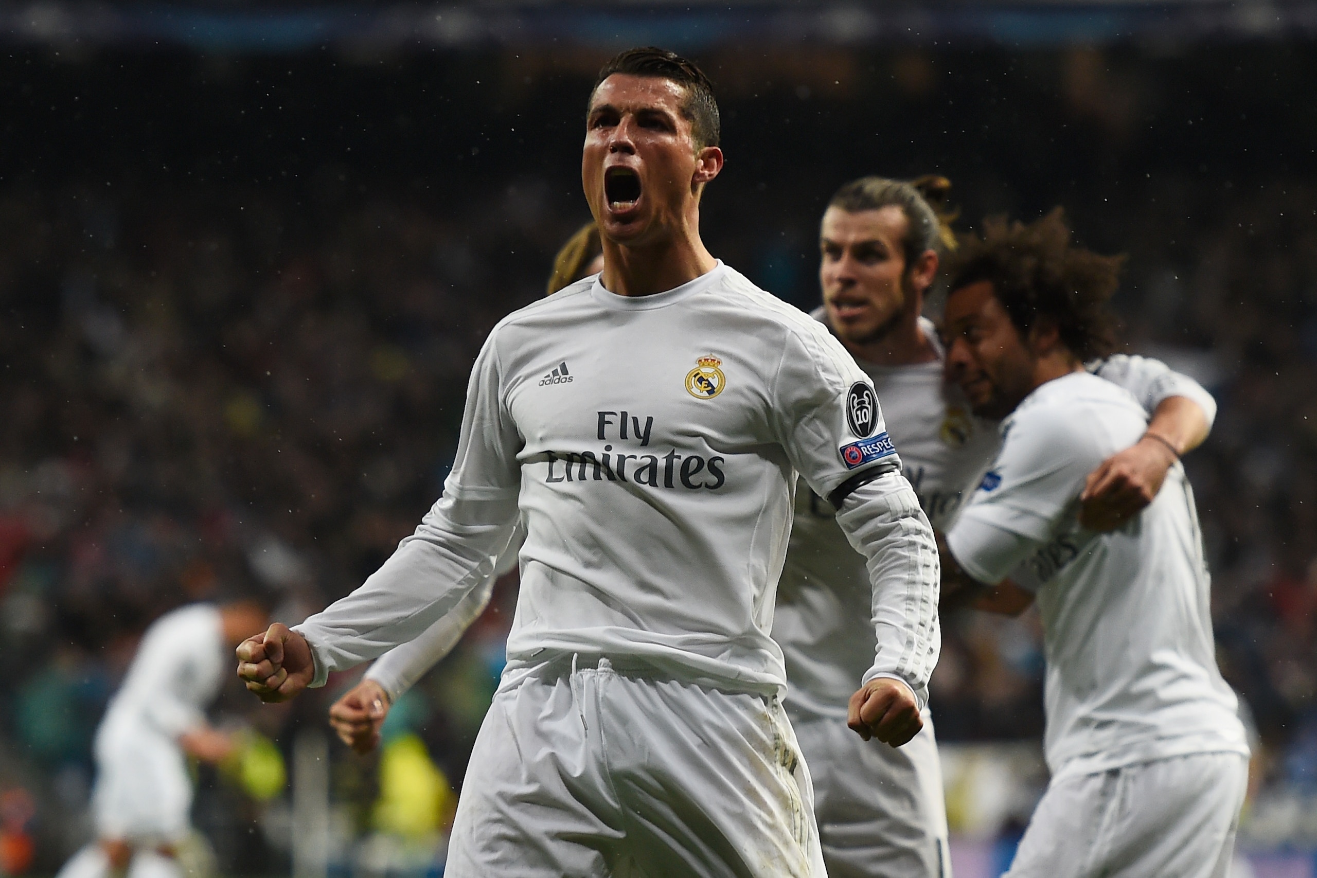 MADRID, SPAIN - APRIL 12: Cristiano Ronaldo of Real Madrid celebrates his second goal during the UEFA Champions League quarter final second leg match between Real Madrid CF and VfL Wolfsburg at Estadio Santiago Bernabeu on April 12, 2016 in Madrid, Spain MADRID, SPAIN - APRIL 12: Cristiano Ronaldo of Real Madrid celebrates his second goal during the UEFA Champions League quarter final second leg match between Real Madrid CF and VfL Wolfsburg at Estadio Santiago Bernabeu on April 12, 2016 in Madrid, Spain
