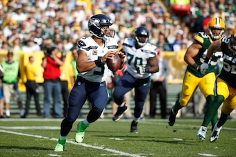 GREEN BAY, WI - SEPTEMBER 10: Russell Wilson #3 of the Seattle Seahawks looks to pass during a game against the Green Bay Packers at Lambeau Field on September 10, 2017 in Green Bay, Wisconsin. The Packers won 17-9. (Photo by Joe Robbins/Getty Images)