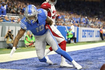 DETROIT, MI - SEPTEMBER 10: Kenny Golladay #19 of the Detroit Lions fumbles the ball in the second half of the game against the Arizona Cardinals at Ford Field on September 10, 2017 in Detroit, Michigan. (Photo by Leon Halip/Getty Images)