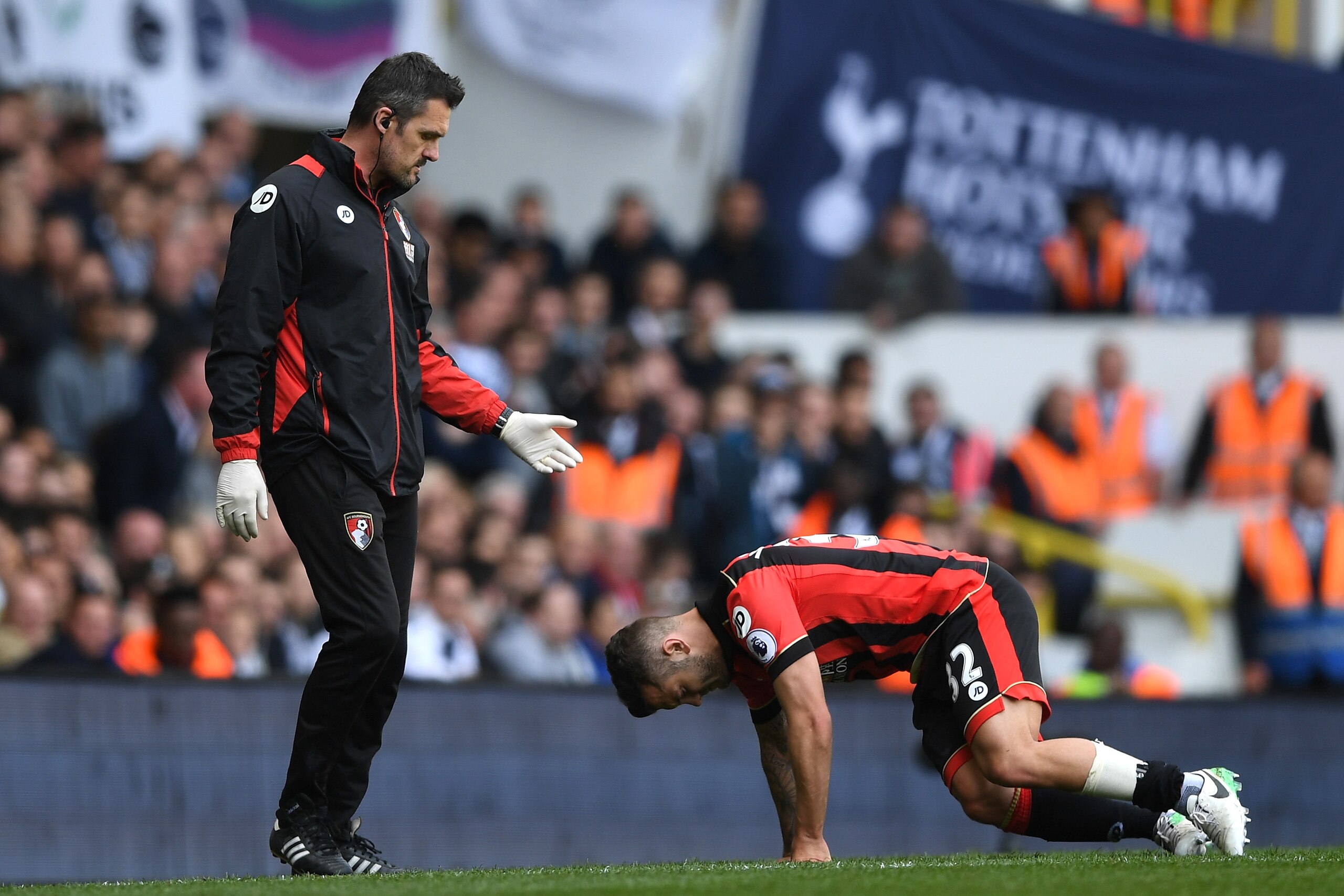 LONDON, ENGLAND - APRIL 15: Jack Wilshere of AFC Bournemouth goes down injured during the Premier League match between Tottenham Hotspur and AFC Bournemouth at White Hart Lane on April 15, 2017 in London, England.  (Photo by Shaun Botterill/Getty Images)