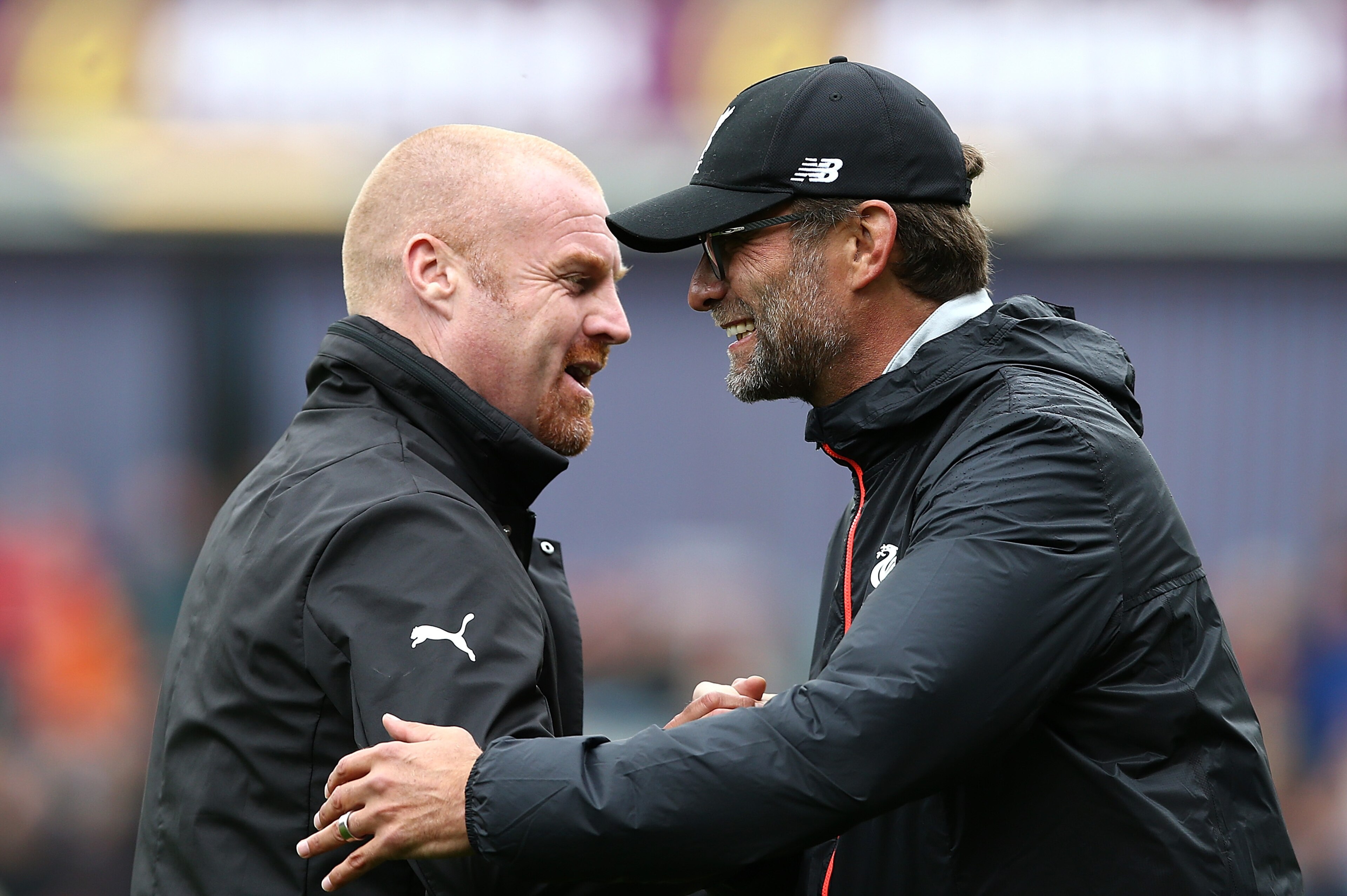 BURNLEY, ENGLAND - AUGUST 20: Manager of Liverpool Jurgen Klopp and Sean Dyche, Manager of Burnley embrace ahead of kick off during the Premier League match between Burnley and Liverpool at Turf Moor on August 20, 2016 in Burnley, England. (Photo by Jan BURNLEY, ENGLAND - AUGUST 20: Manager of Liverpool Jurgen Klopp and Sean Dyche, Manager of Burnley embrace ahead of kick off during the Premier League match between Burnley and Liverpool at Turf Moor on August 20, 2016 in Burnley, England. (Photo by Jan