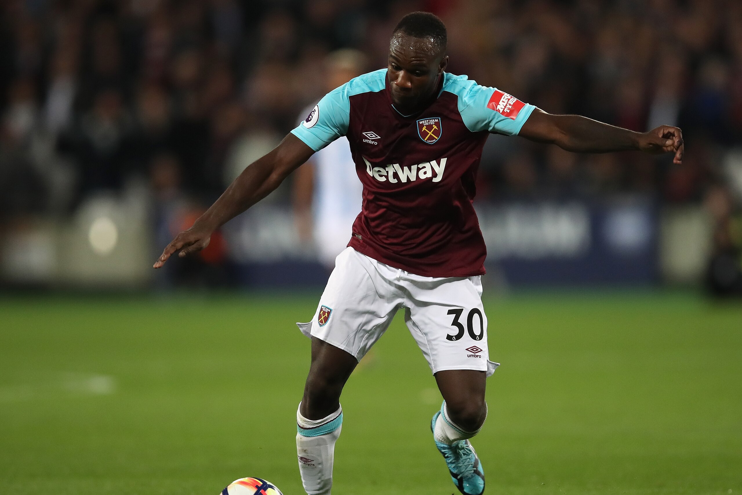 LONDON, ENGLAND - SEPTEMBER 11:  Michail Antonio of West Ham in action during the Premier League match between West Ham United and Huddersfield Town at London Stadium on September 11, 2017 in London, England.  (Photo by Julian Finney/Getty Images)