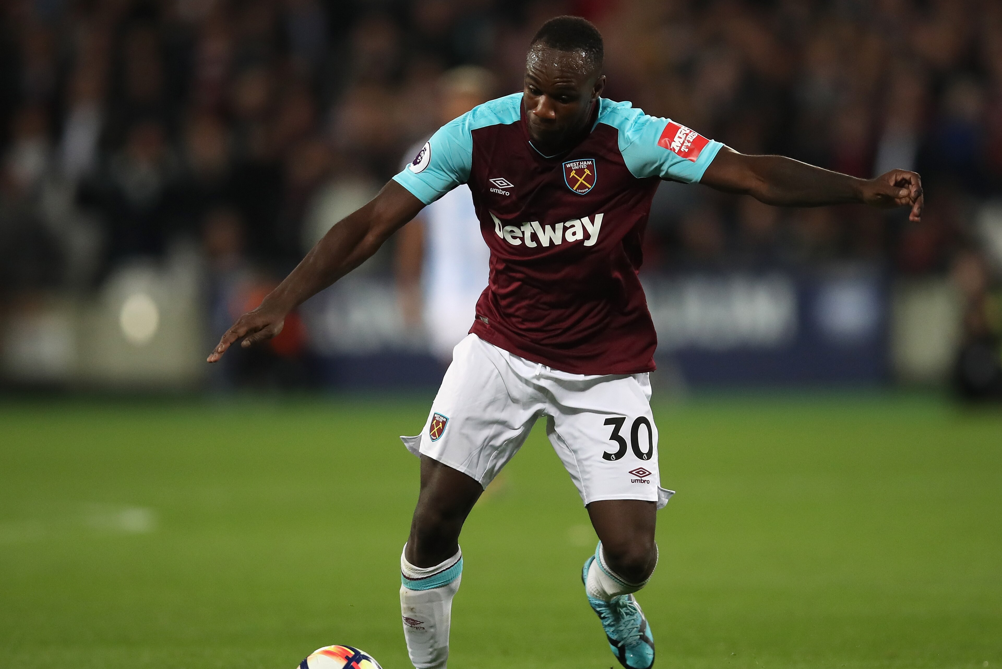 LONDON, ENGLAND - SEPTEMBER 11:  Michail Antonio of West Ham in action during the Premier League match between West Ham United and Huddersfield Town at London Stadium on September 11, 2017 in London, England.  (Photo by Julian Finney/Getty Images)