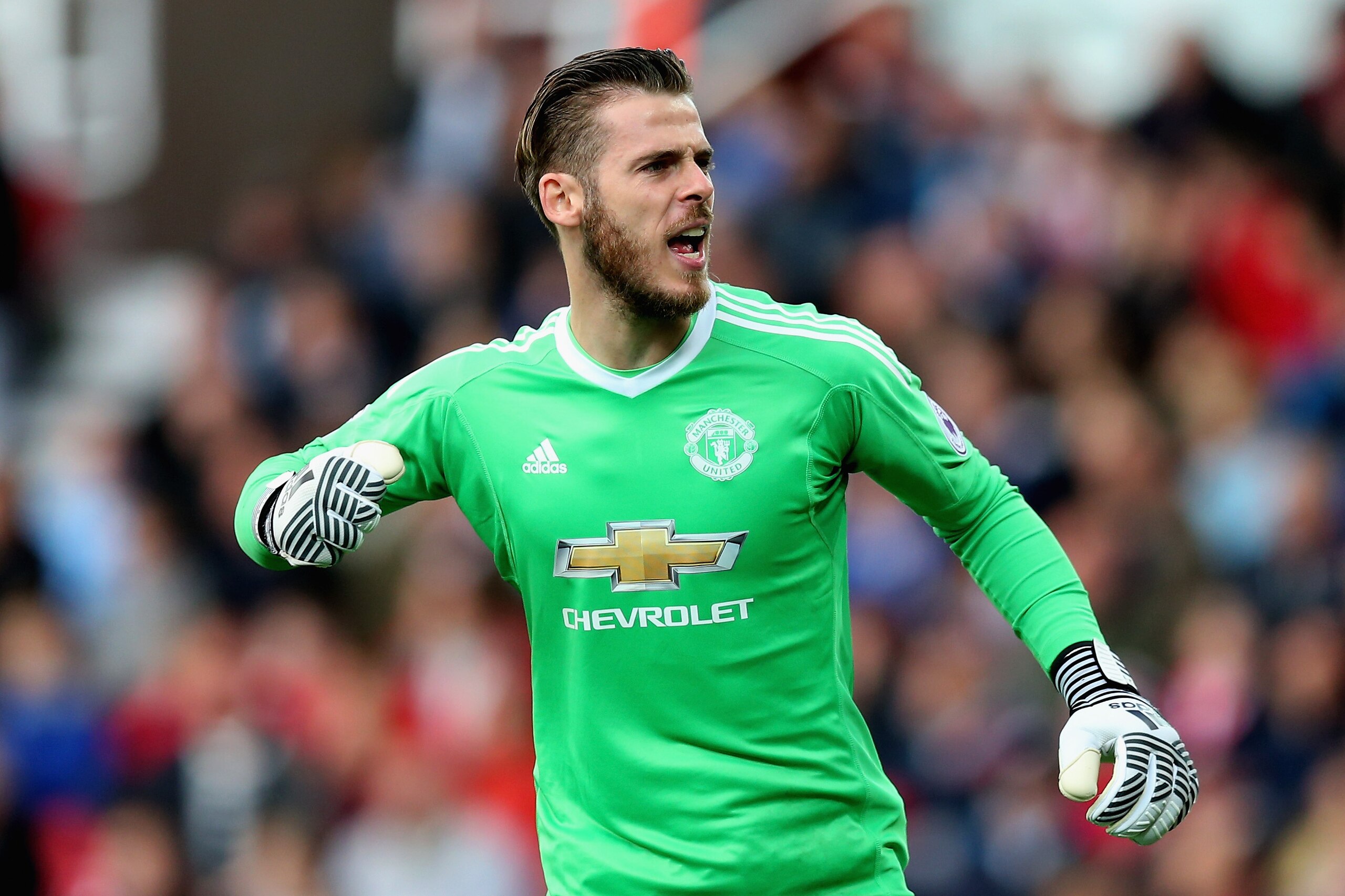 STOKE ON TRENT, ENGLAND - SEPTEMBER 09:  David De Gea of Manchester United celebrates after his side score their second goal during the Premier League match between Stoke City and Manchester United at Bet365 Stadium on September 9, 2017 in Stoke on Trent,