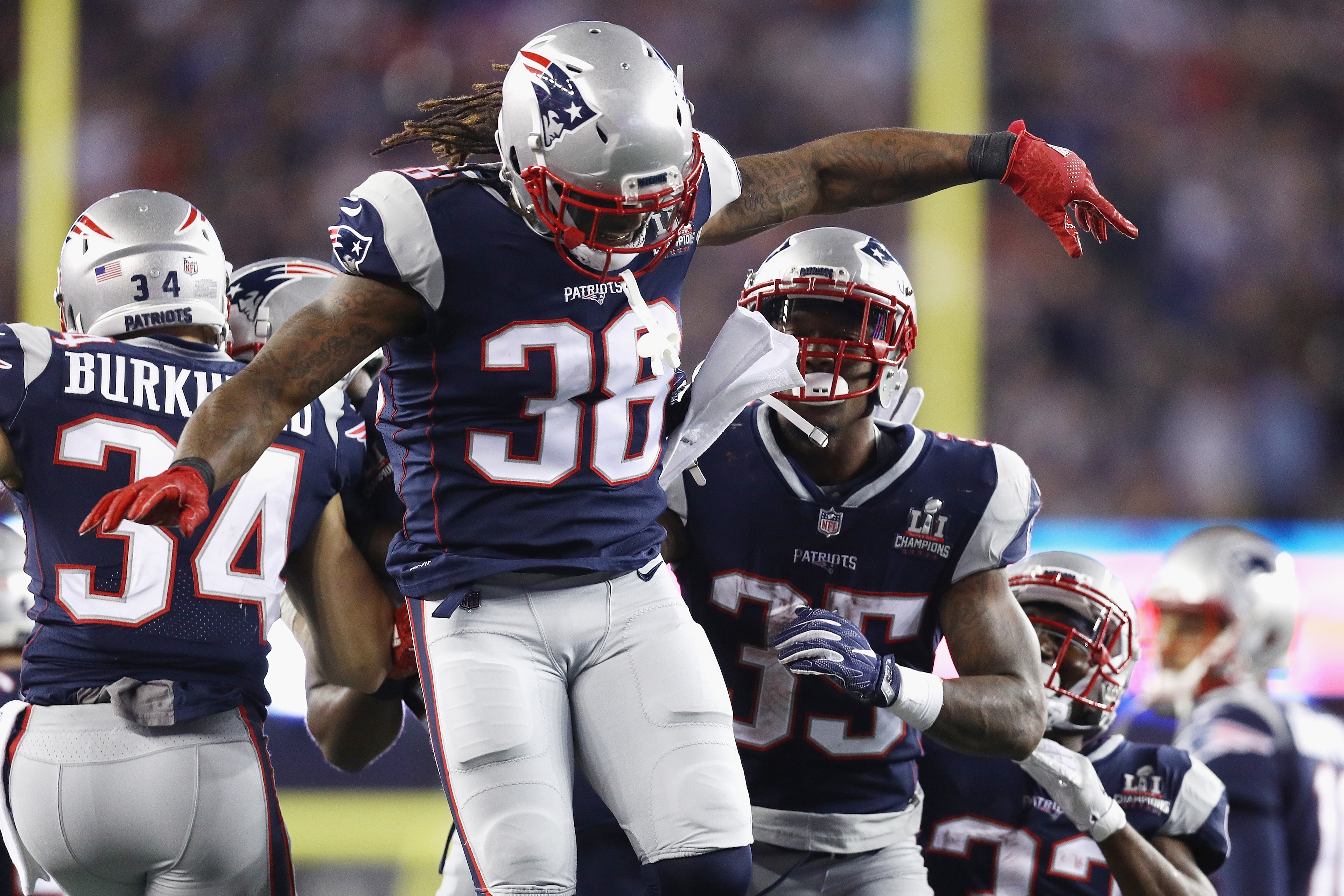 FOXBORO, MA - SEPTEMBER 07:  Brandon Bolden #38 of the New England Patriots celebrates with Mike Gillislee #35 after Gillislee scored a third quarter touchdown against the Kansas City Chiefs at Gillette Stadium on September 7, 2017 in Foxboro, Massachuset