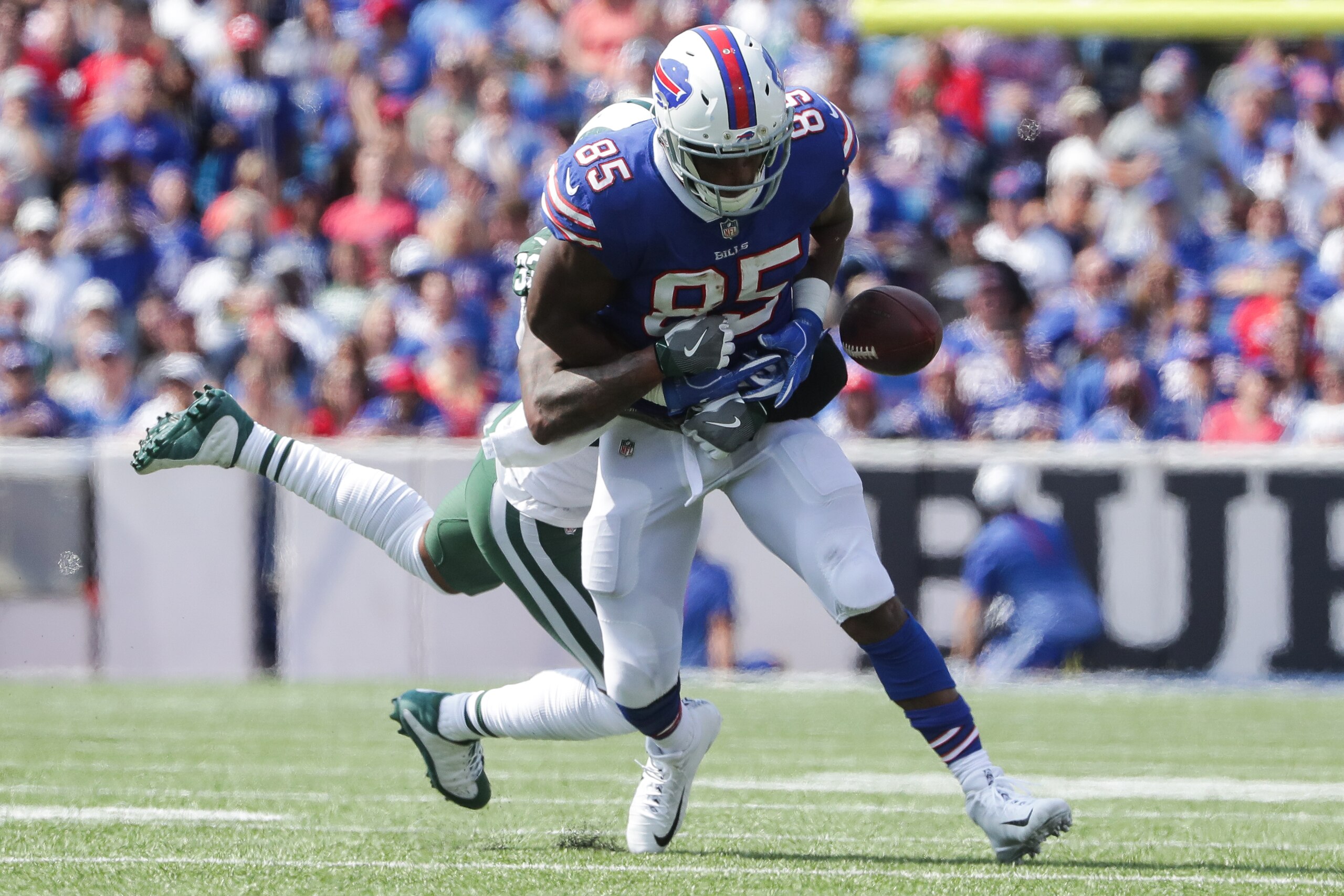 ORCHARD PARK, NY - SEPTEMBER 10:  Charles Clay #85 of the Buffalo Bills loses the ball defended by Jamal Adams #33 of the New York Jets during the first half on September 10, 2017 at New Era Field in Orchard Park, New York.  (Photo by Tom Szczerbowski/Get