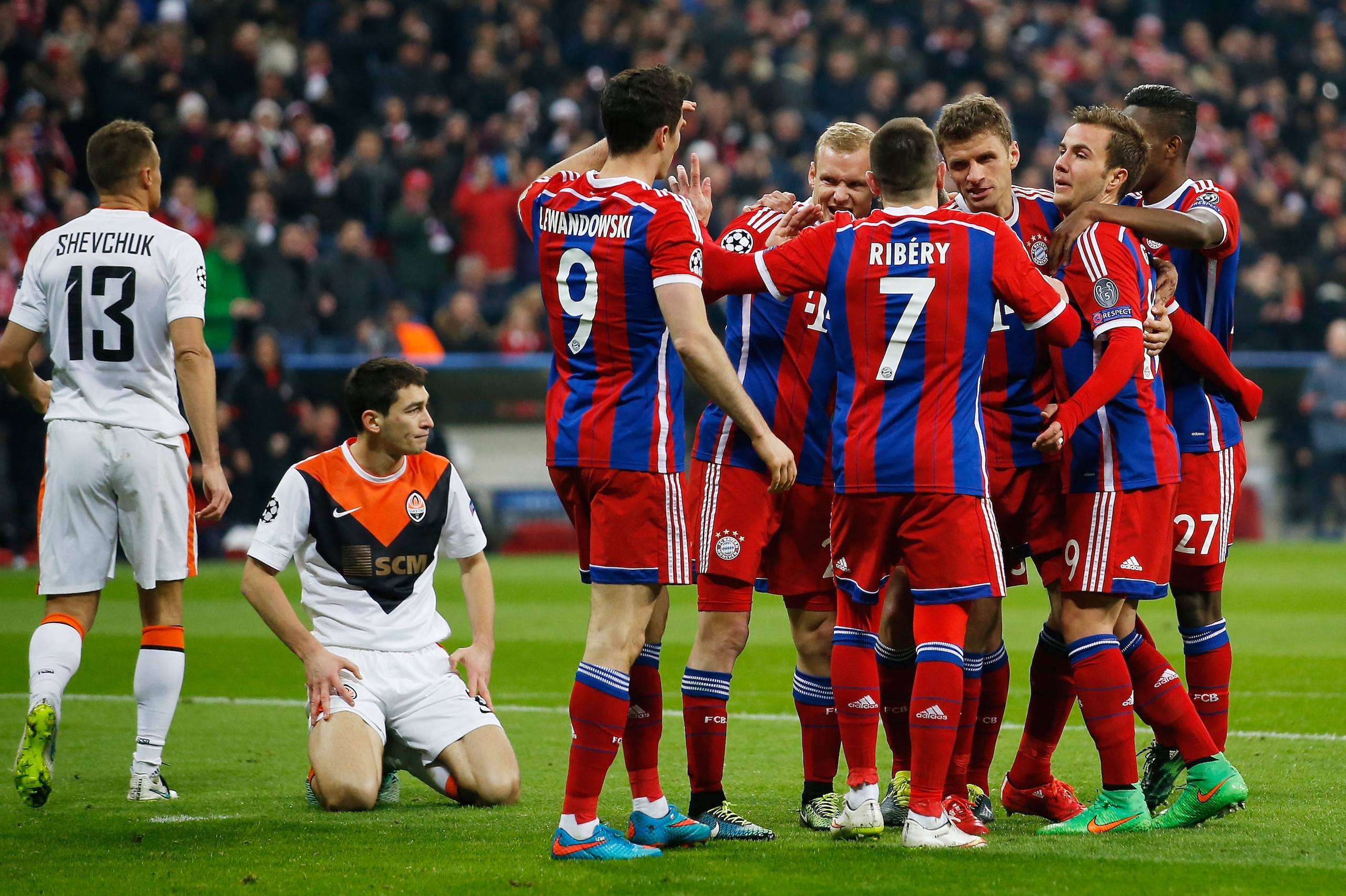 MUNICH, GERMANY - MARCH 11: Thomas Mueller (3.R) of Muenchen celebrates with team mates after scoring his team's fourth goal during the UEFA Champions League Round of 16 second leg match between FC Bayern Muenchen and FC Shakhtar Donetsk at Allianz Arena MUNICH, GERMANY - MARCH 11: Thomas Mueller (3.R) of Muenchen celebrates with team mates after scoring his team's fourth goal during the UEFA Champions League Round of 16 second leg match between FC Bayern Muenchen and FC Shakhtar Donetsk at Allianz Arena