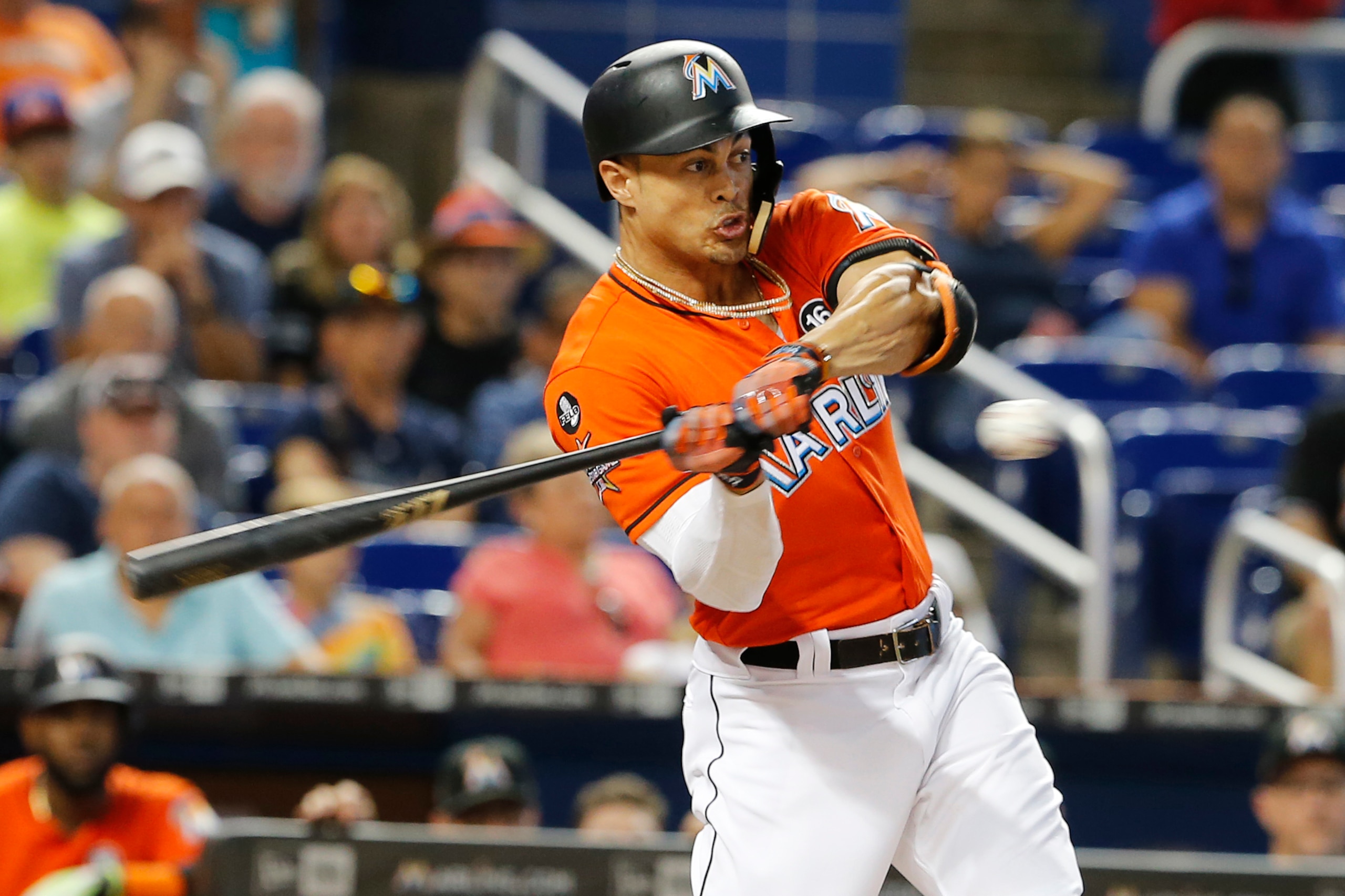 MIAMI, FL - SEPTEMBER 3:   Giancarlo Stanton #27 of the Miami Marlins swings and strikes out in the first inning against the Philadelphia Phillies at Marlins Park on September 3, 2017 in Miami, Florida.  (Photo by Joe Skipper/Getty Images)