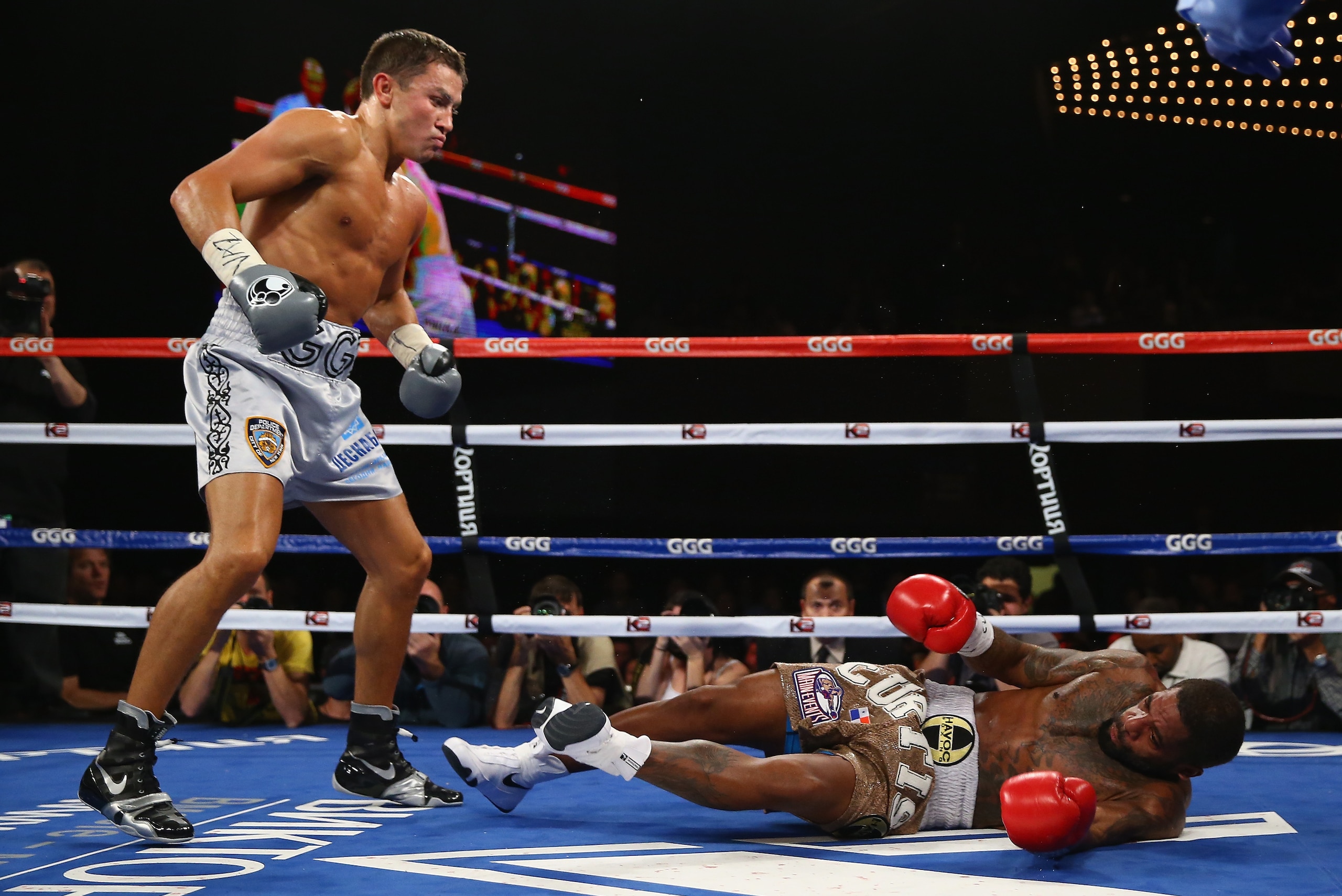 NEW YORK, NY - NOVEMBER 02:  Gennady Golovkin knocks down Curtis Stevens in the second round during their WBA Middleweight Title fight at The Theater at Madison Square Garden on November 2, 2013 in New York City.  (Photo by Al Bello/Getty Images)