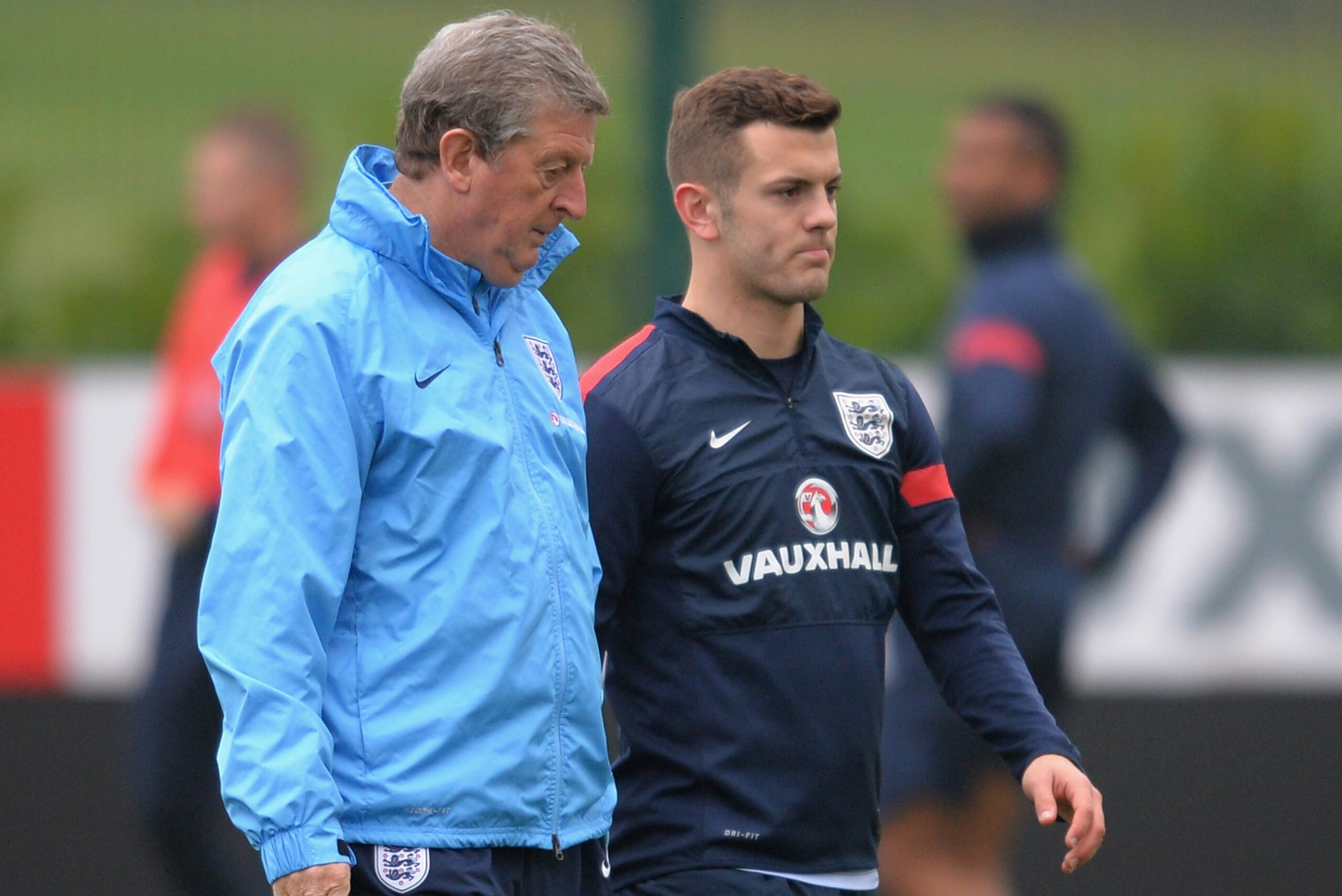 ST ALBANS, ENGLAND - NOVEMBER 18:  Coach Roy Hodgson talks to Jack Wilshere during a England Training session at London Colney on November 18, 2013 in St Albans, England.  (Photo by Christopher Lee/Getty Images)