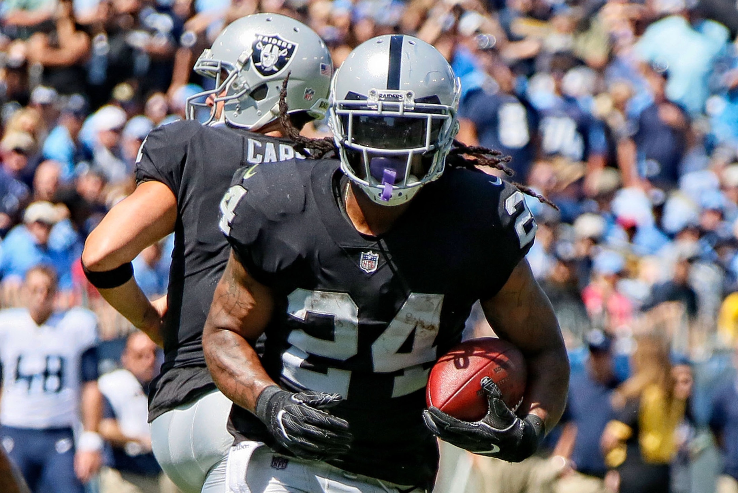 NASHVILLE, TN - SEPTEMBER 10:  Marshawn Lynch #24 of the Oakland Raiders plays against the Tennessee Titans at Nissan Stadium on September 10, 2017 in Nashville, Tennessee.  (Photo by Frederick Breedon/Getty Images)