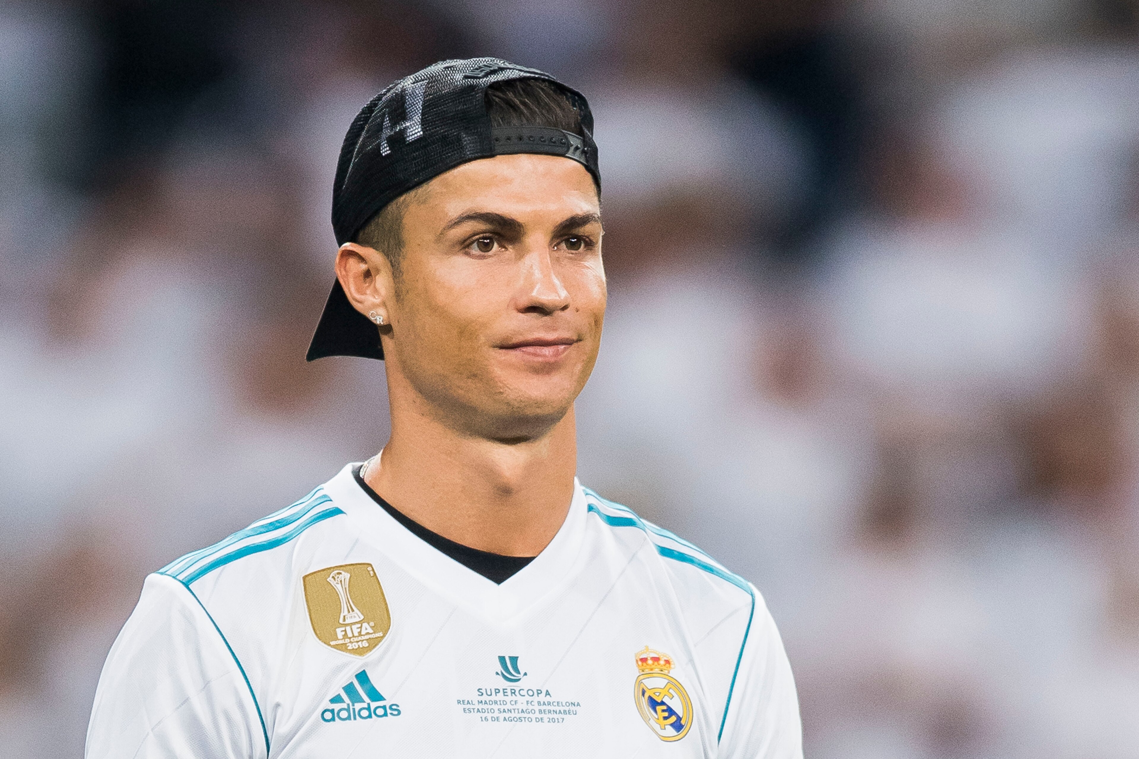 MADRID, SPAIN - AUGUST 16 - Cristiano Ronaldo of Real Madrid celebrates the team's winning the Supercopa de Espana after the Supercopa de Espana Final 2nd Leg match between Real Madrid and FC Barcelona at the Estadio Santiago Bernabeu on 16 August 2017 in