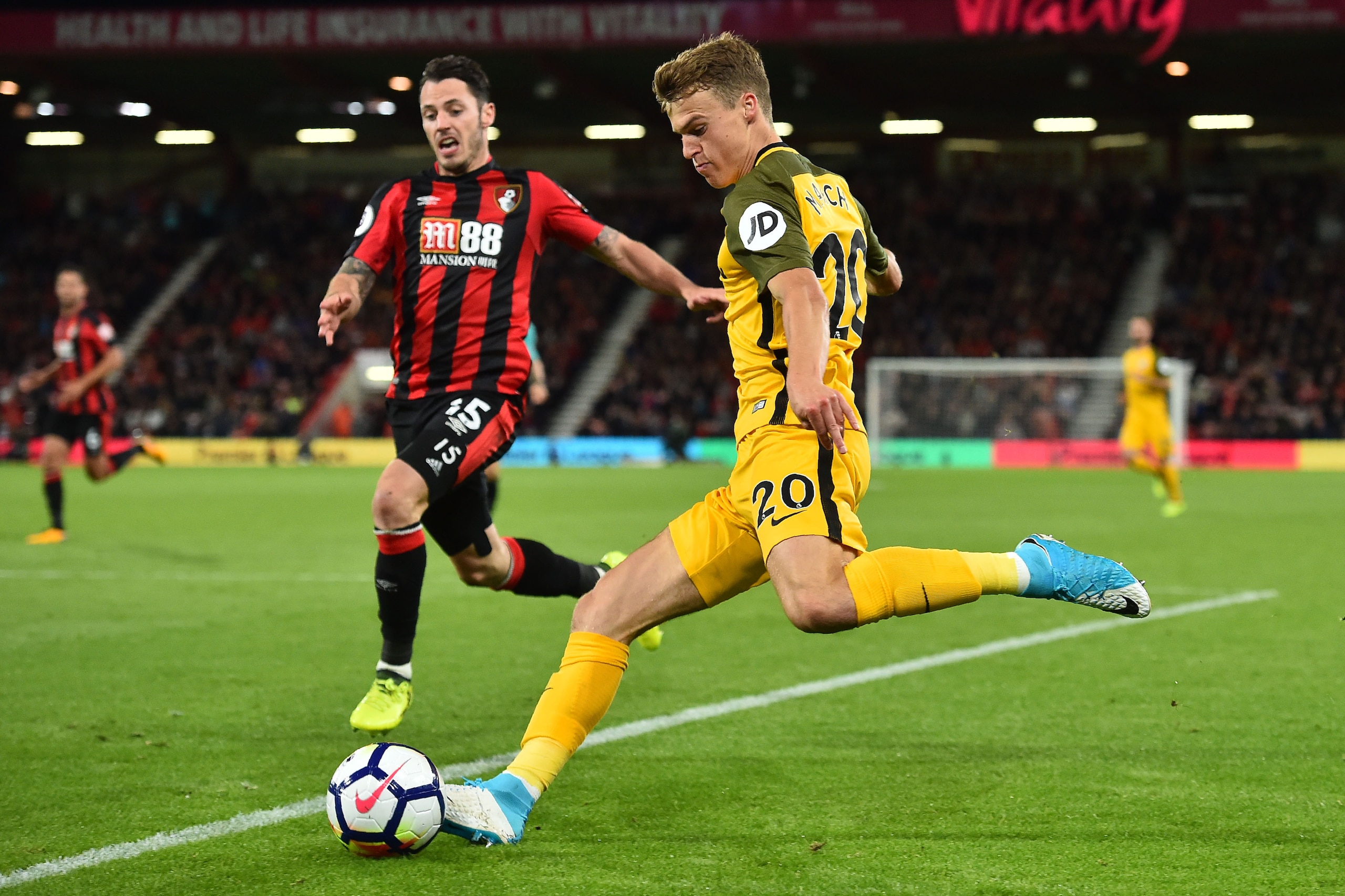 Brighton's English midfielder Solly March (R) vies with Bournemouth's English defender Adam Smith during the English Premier League football match between Bournemouth and Brighton at the Vitality Stadium in Bournemouth, southern England on September 15, 2