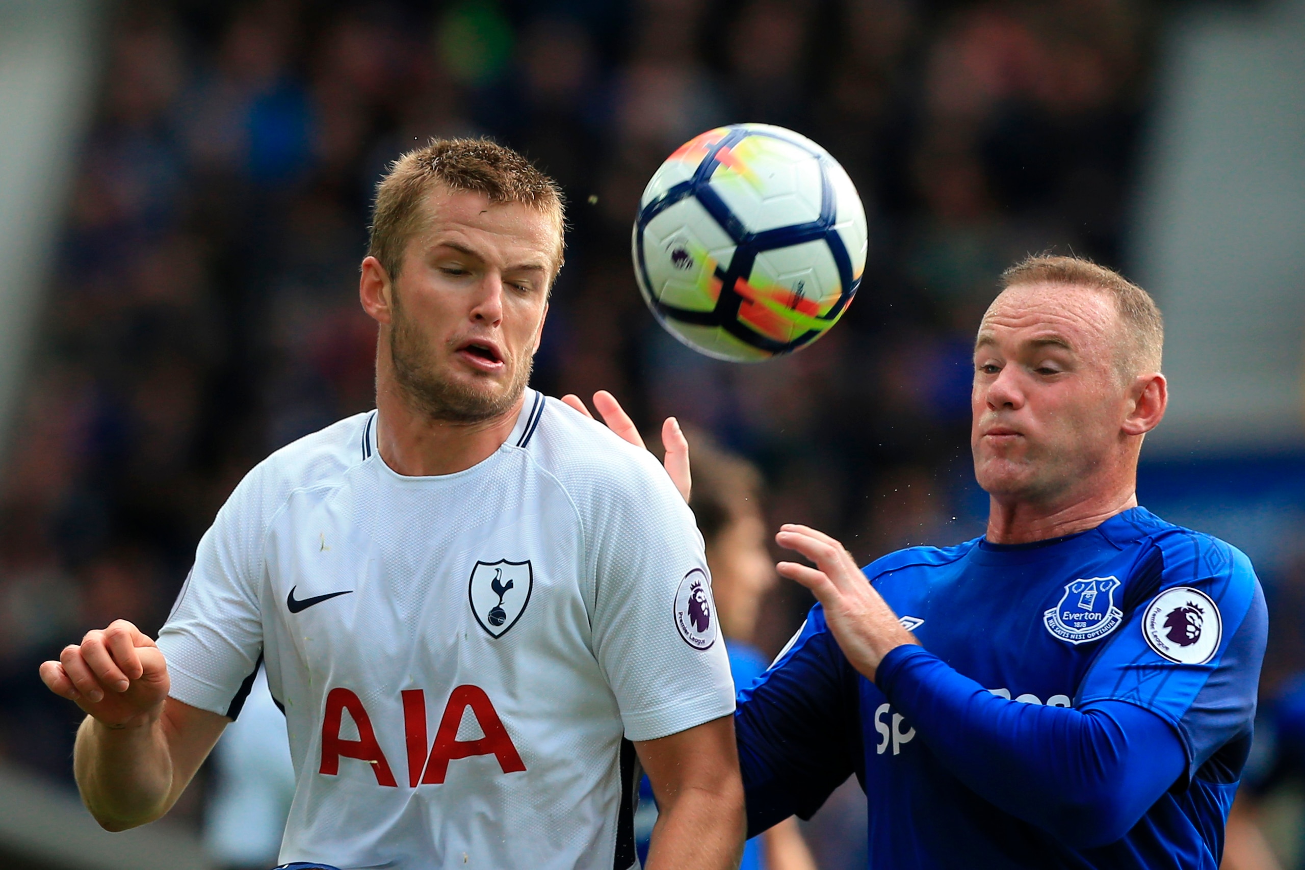 Tottenham Hotspur's English defender Eric Dier (L) vies with Everton's English striker Wayne Rooney (R) during the English Premier League football match between Everton and Tottenham Hotspur at Goodison Park in Liverpool, north west England on September 9