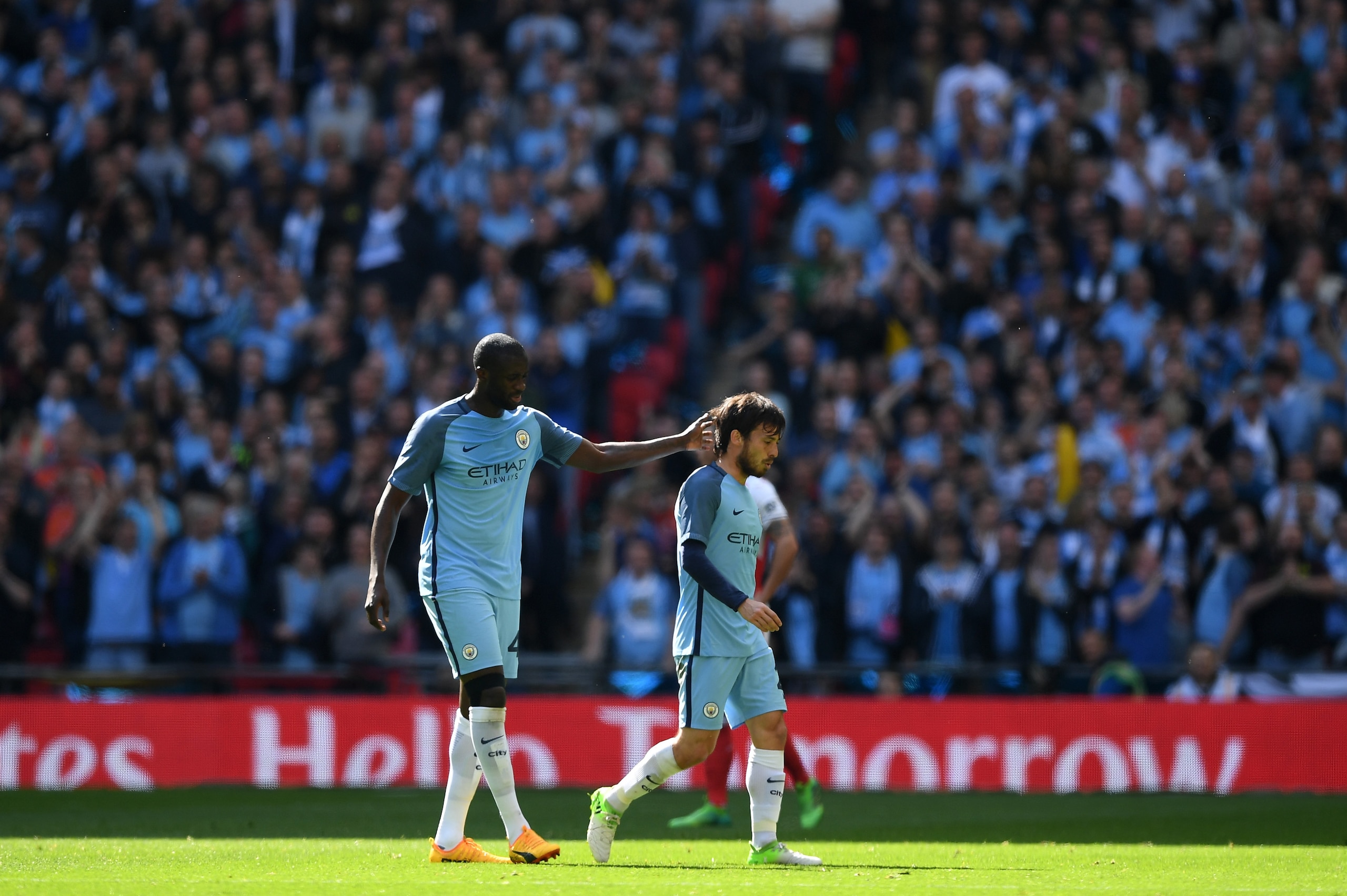LONDON, ENGLAND - APRIL 23:  David Silva (R) of Manchester City is consoled by Yaya Toure (L) as he is replaced after an injury during the Emirates FA Cup Semi-Final match between Arsenal and Manchester City at Wembley Stadium on April 23, 2017 in London,
