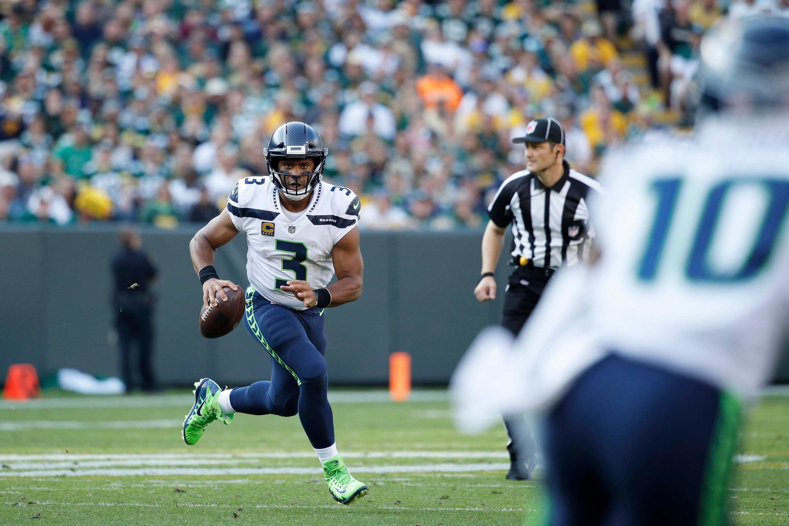 GREEN BAY, WI - SEPTEMBER 10: Russell Wilson #3 of the Seattle Seahawks looks to pass during a game against the Green Bay Packers at Lambeau Field on September 10, 2017 in Green Bay, Wisconsin. The Packers won 17-9. (Photo by Joe Robbins/Getty Images)