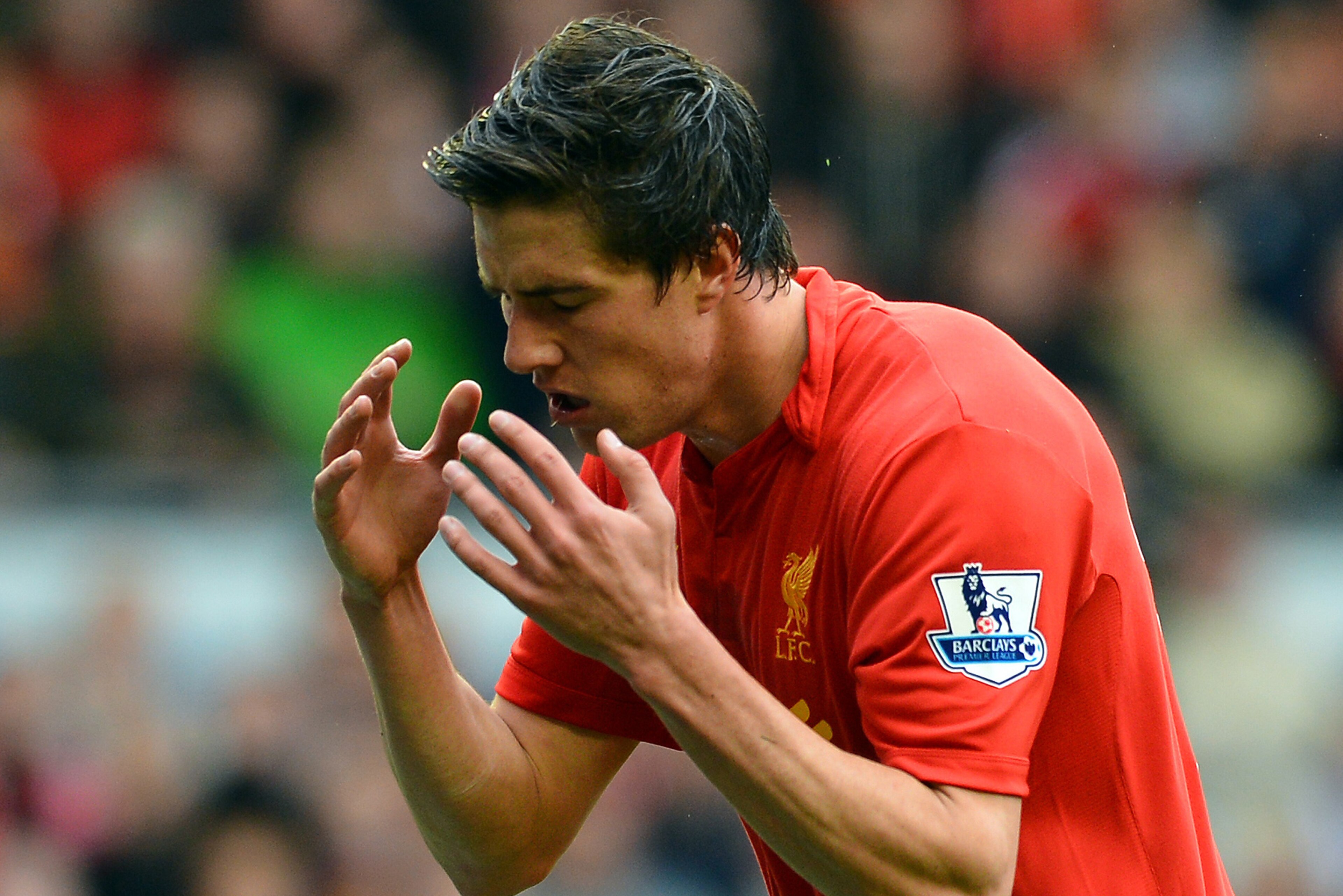 Liverpool's English defender Martin Kelly reacts during the English Premier League football match between Liverpool and Manchester United at Anfield in Liverpool, north-west England on September 23, 2012. AFP PHOTO/PAUL ELLIS

RESTRICTED TO EDITORIAL USE.